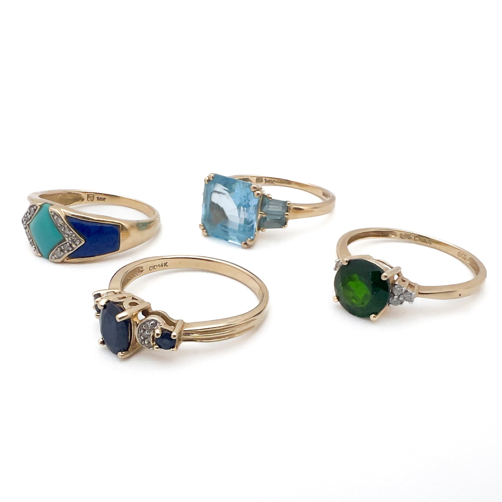 Four Gold Rings With Colorful Gems (1 of 3)