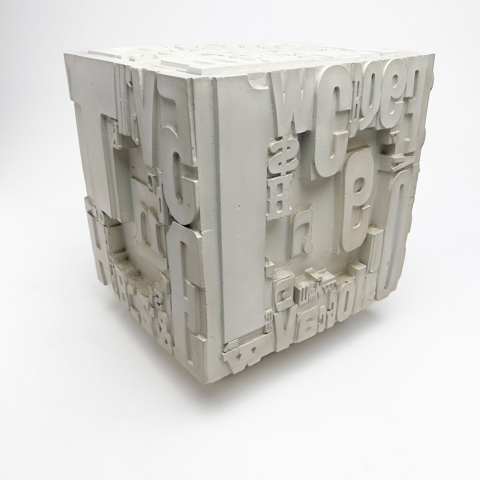 Sheldon Rose (manner of) - Typeset Cube Stool: Lot 3 Sheldon Rose (manner of) American (20th Century) Typeset Cube Stool enameled fiberglass 14 1/2 x 16 x 12 1/2 inches Provenance: The Estate of Carol L. Aerenson