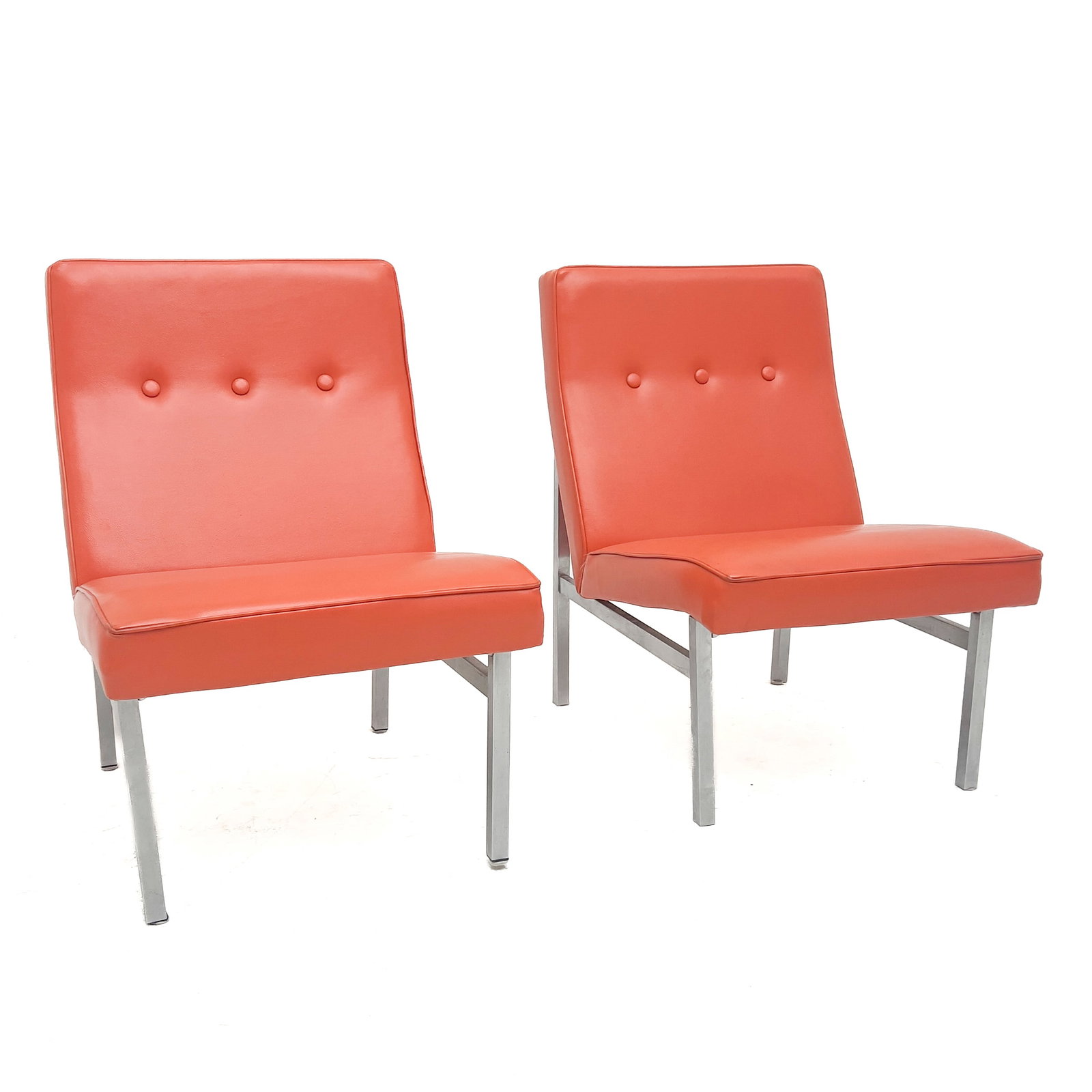 A Pair of Mid-Century Modern Orange Vinyl Slipper Chairs: Lot 14 A Pair of Mid-Century Modern Orange Vinyl Slipper Chairs Orange vinyl upholstery with button-tufting, chrome-plated square tubular steel frames, and foam-padded seats and backs each: 32 x 30 x 