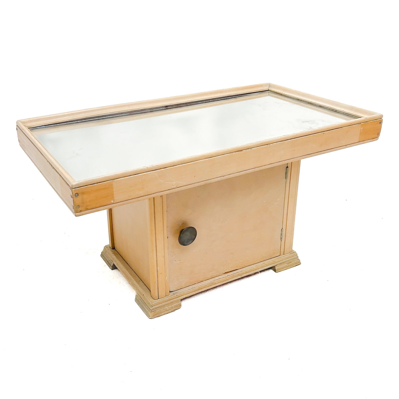 Art Deco Style Mirrored Bar Coffee Table: Lot 31 Art Deco Style Mirrored Bar Coffee Table (20th Century) Wood, Mirror, Glass, Metal 16 1/2 x 31 1/4 x 17 1/2 inches Description: An Art Deco style low dry bar table featuring a rectangular inset