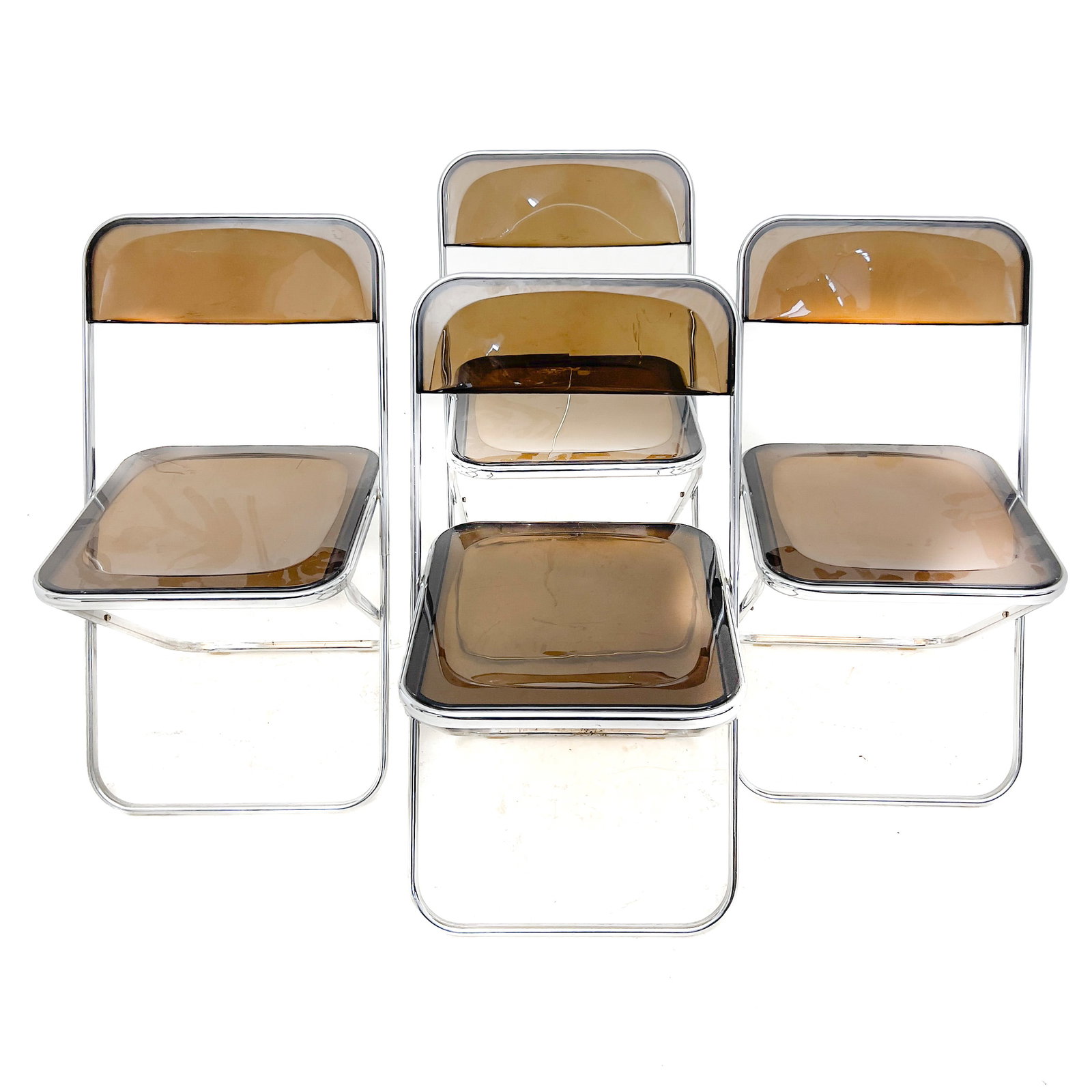 Four Mid-Century Modern Folding Chairs: Lot 32 Four Mid-Century Modern Folding Chairs (20th Century) Chrome-Plated Steel, Polycarbonate each: 31 x 20 5/8 x 17 5/8 inches Description: A set of four mid-century modern folding chairs, each fea