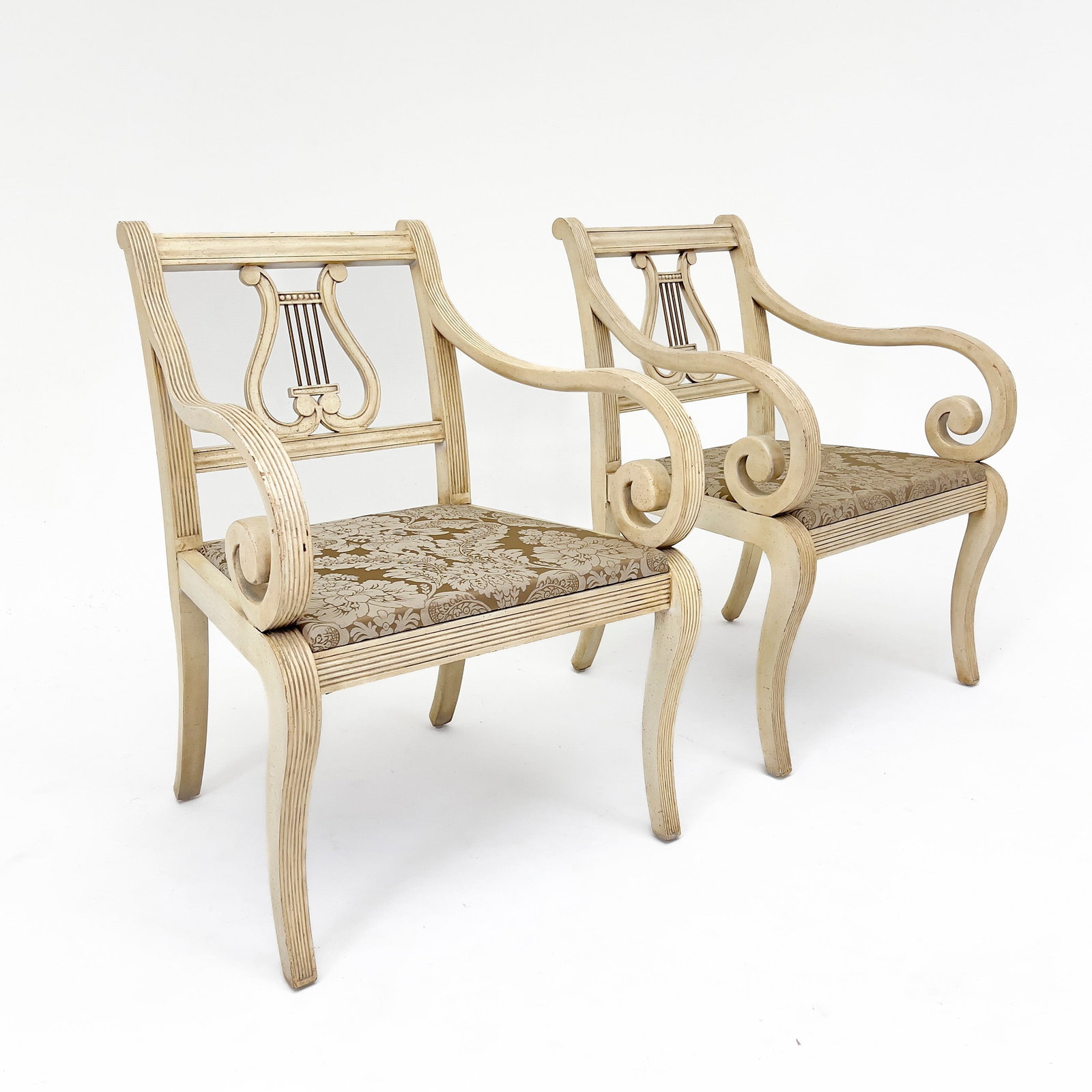 Thomasville Centennial Lyre-back Arm Chairs, Pair: Lot 44 Thomasville Centennial Lyre-back Arm Chairs, Pair limed wood, brass, upholstery each: 35 1/4x 19 x 3/4 x 26 inches Description: Two chairs, with upholstered seats and bolsters, brass collectors