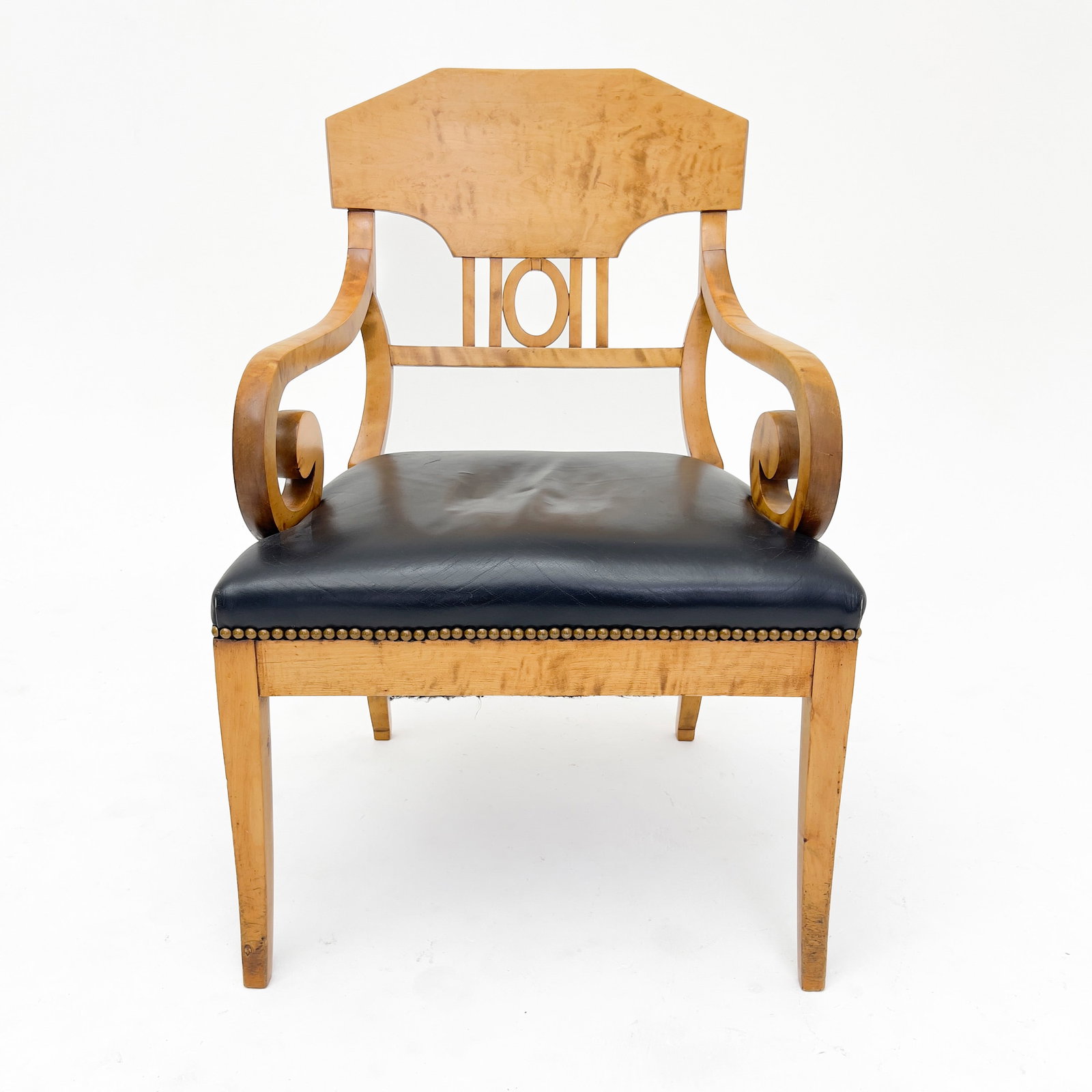 A Biedermeier Style Birch Armchair: Lot 47 A Biedermeier Style Birch Armchair Birch wood, synthetic leather, brass hardware 36 1/2 x 23 1/4 x 23 1/8 inches Description: A mid-20th century Biedermeier style armchair constructed from