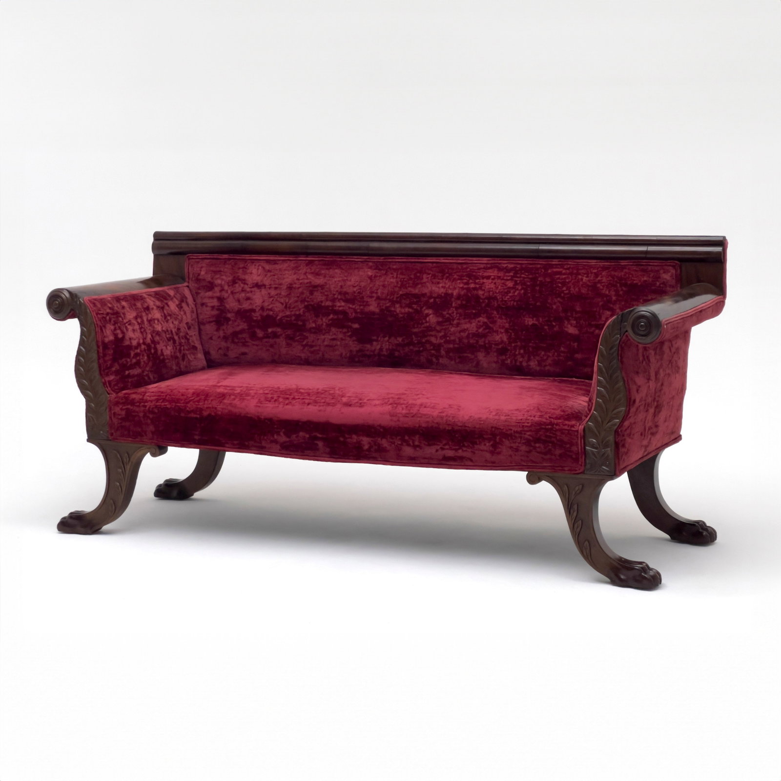 An American Empire Style Mahogany Sofa: Lot 54 An American Empire Style Mahogany Sofa (19th/20th Century) 31 1/2 x 68 1/2 x 23 1/2 inches Description: An American Empire style mahogany sofa, dating to the nineteenth or twentieth century,
