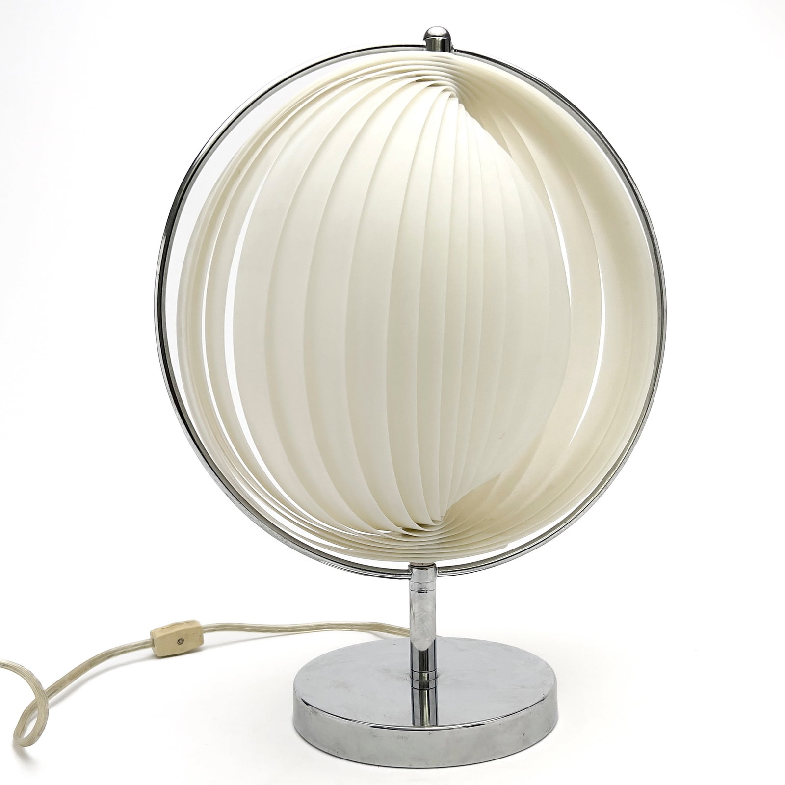 Verner Panton Style Moon Lamp: Lot 94 Verner Panton Style Moon Lamp chrome, plastic 15 x 12 x 12 inches Description: A contemporary table lamp styled after Verner Panton's Moon lamp. Provenance: From a Private Central Park West Col