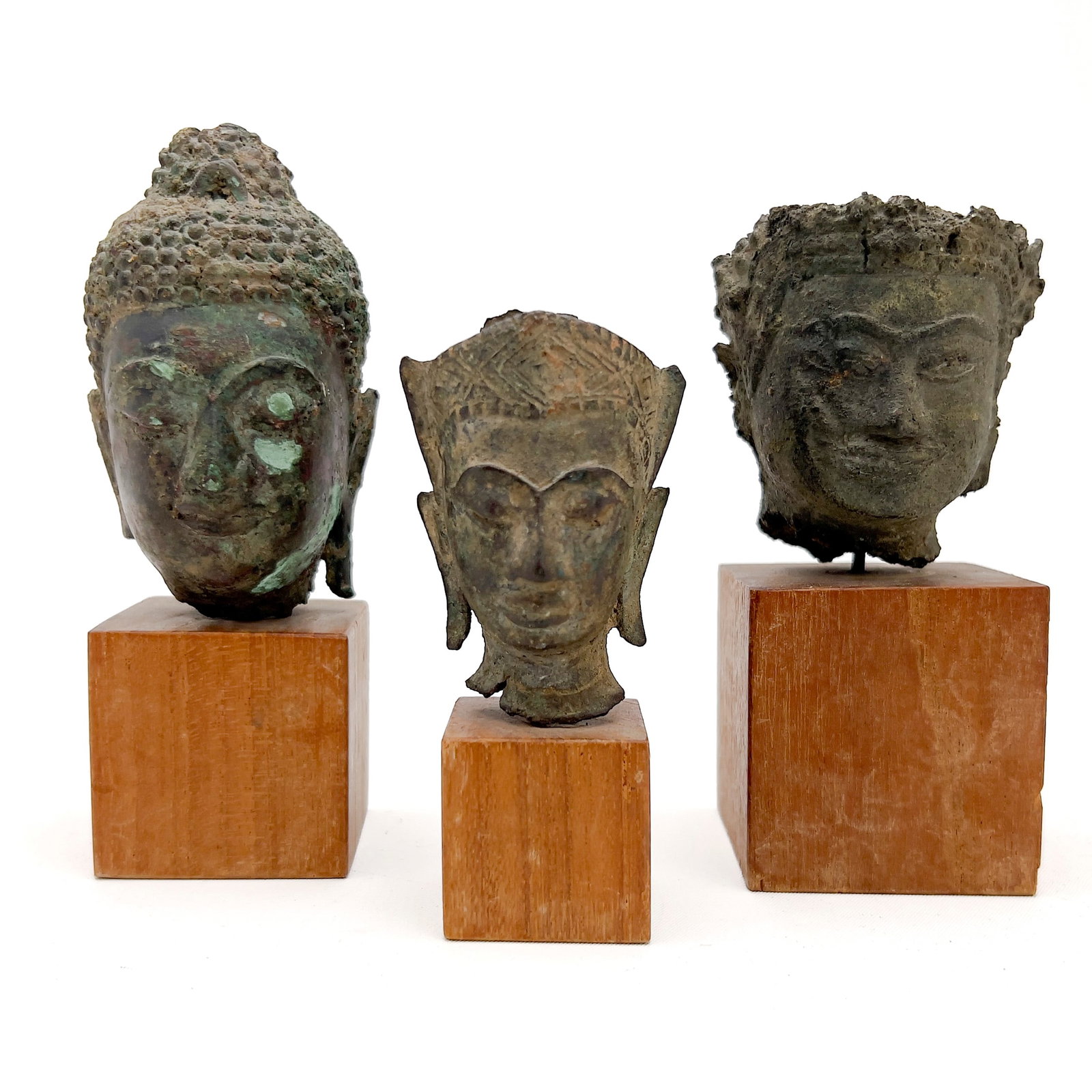 Three Small Buddha Head Fragments Mounted On Stands (1 of 3)