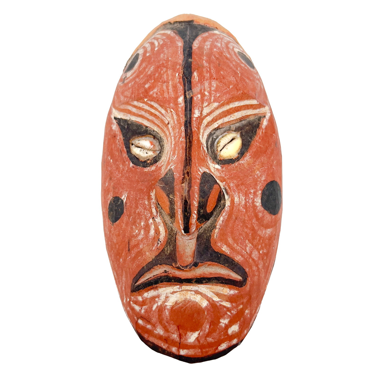 Oceanic Ceremonial Mask: Lot 178 Oceanic Ceremonial Mask wood, pigment 9 1/2 x 4 1/2 x 3 1/2 inches Description: An Oceanic ceremonial mask carved from wood or pith with an oval form and features cowrie shell insets for eyes,