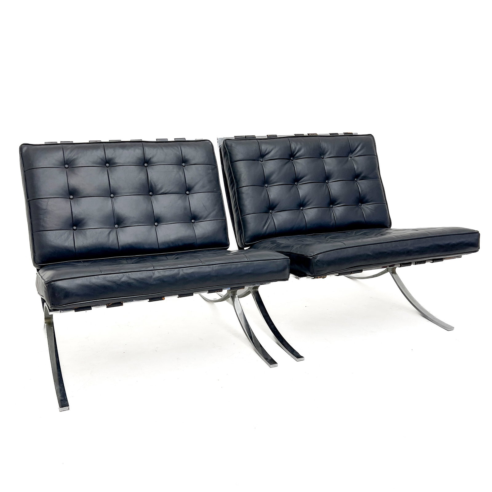 A Pair of Barcelona Style Leather Lounge Chairs by Supreme Industria Argentina (1 of 5)
