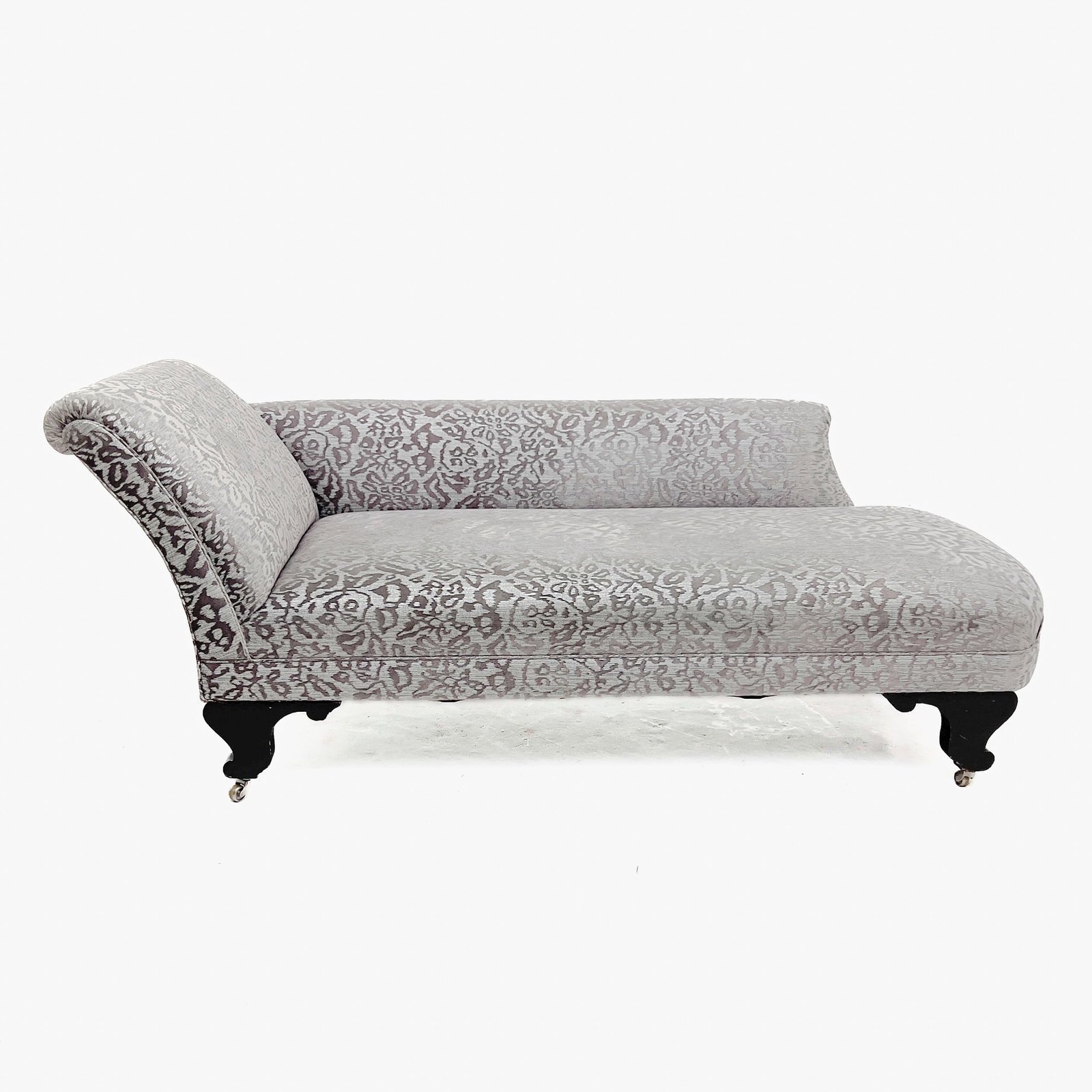 A Contemporary Brocade Upholstered Chaise Longue: Lot 174 A Contemporary Brocade Upholstered Chaise Longue Brocade fabric, wood, foam, steel, brass. 30 x 70 x 29 inches Description: An asymmetrical contemporary chaise longue upholstered in a