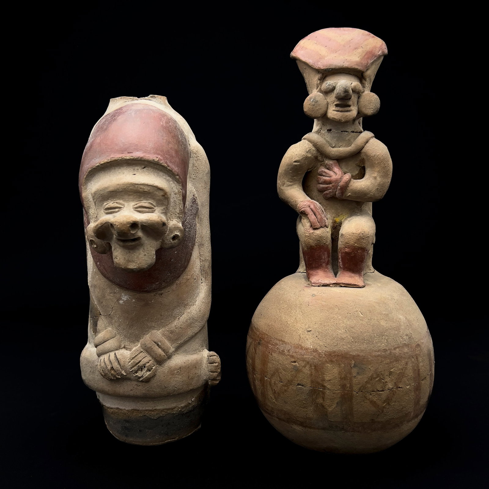 Two Pre-Columbian Ecuadorian Style Ceramic Figural Vessels: Lot 302 Two Pre-Columbian Ecuadorian Style Ceramic Figural Vessels Low-fired earthenware, red pigment slip, black pigment slip, cream pigment slip larger: 14 x 5 1/2 x 5 1/2 inches Description: Two