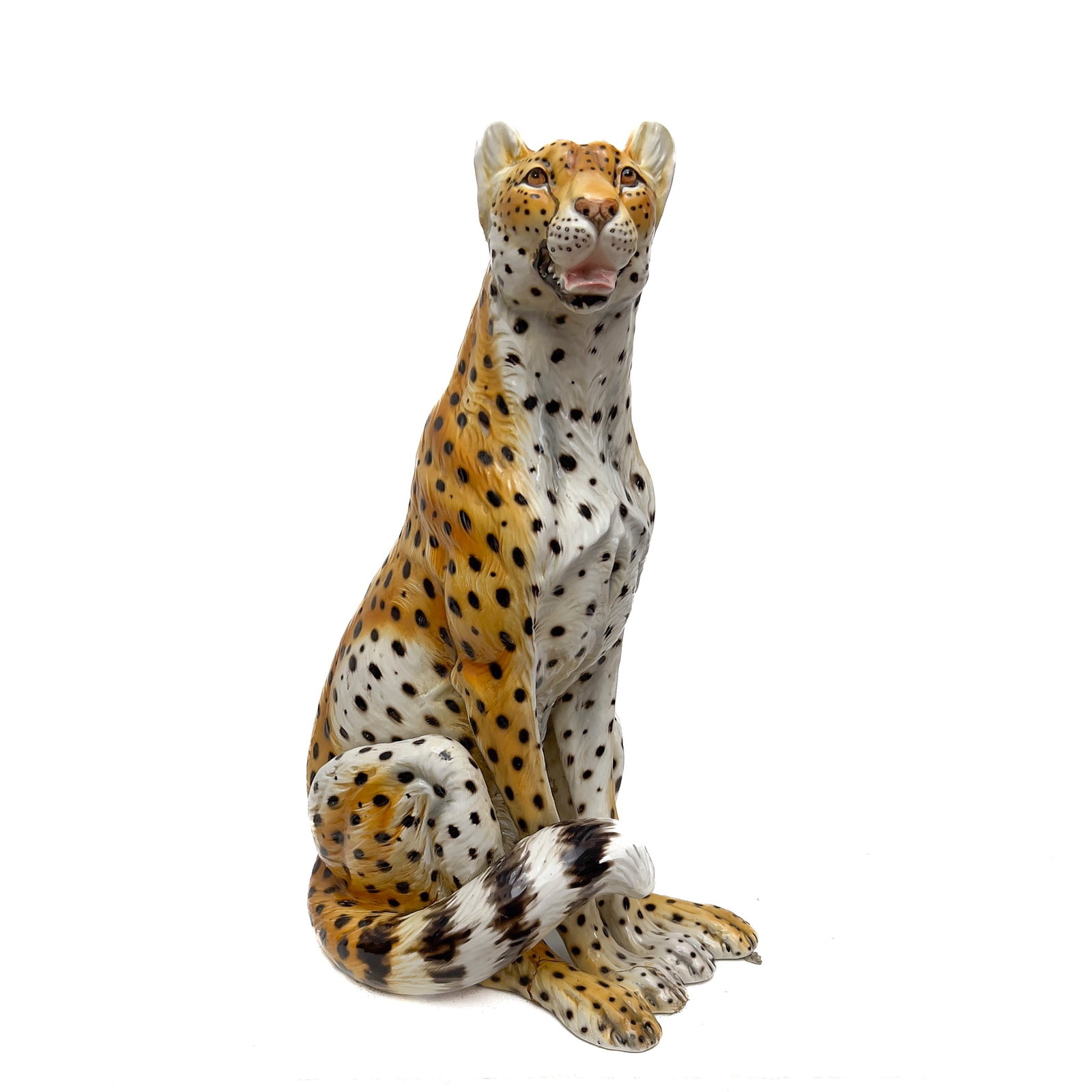 Ronzan - Polychrome Glazed Ceramic Seated Cheetah: Lot 317 Ronzan Italian Manufacturer (1939-2001) Polychrome Glazed Ceramic Seated Cheetah (Mid-20th Century) White earthenware, glaze, paint 26 x 12 x 14 1/2 inches Description: A polychrome painted