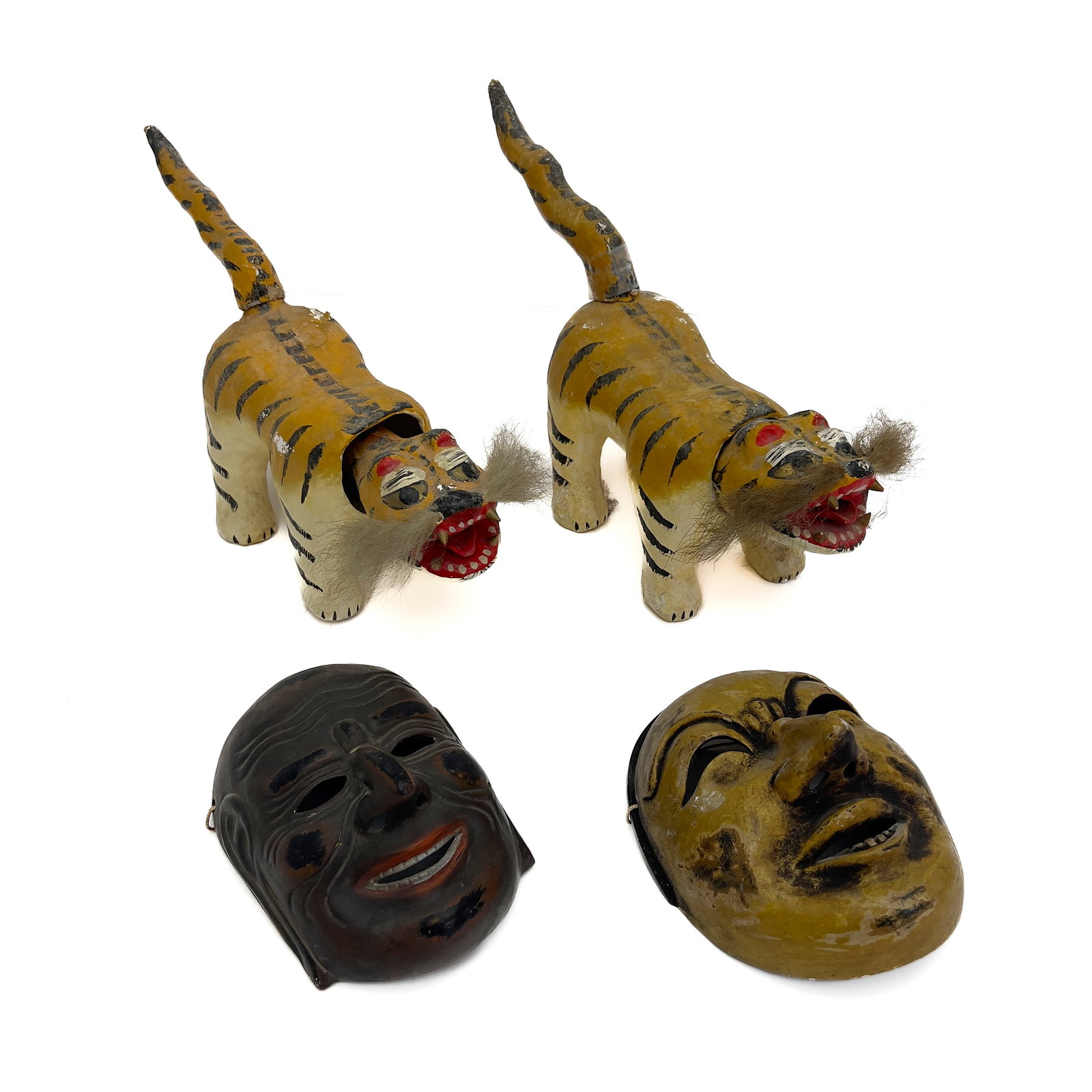 Collection of Japanese Hariko Folk Art Paper-Mache Tigers and Ritual Bugaku Masks: Lot 6 Collection of Japanese Hariko Folk Art Paper-Mache Tigers and Ritual Bugaku Masks (20th Century) Paper-mache, Plaster, Washi paper, Fabric mesh, Pigment, Ink, Synthetic fur 20 1/2 x 10 1/2 x 6 i