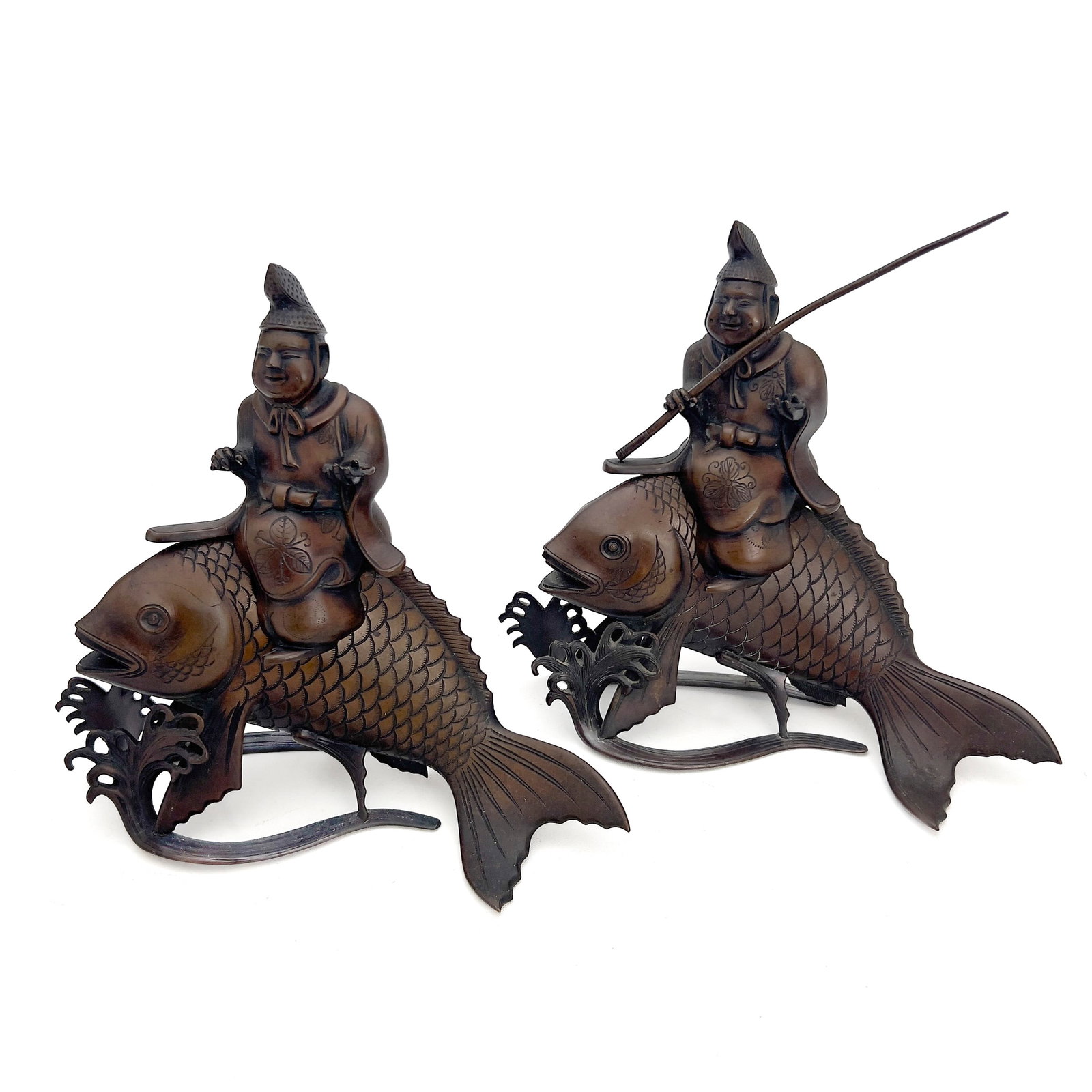 Pair of Japanese Bronze Ebisu and Carp Incense Burners (Koro): Lot 22 Pair of Japanese Bronze Ebisu and Carp Incense Burners (Koro) (19th/20th Century) bronze each: 9 3/4 x 10 1/2 x 5 inches Description: A pair of Japanese patinated bronze figural incense