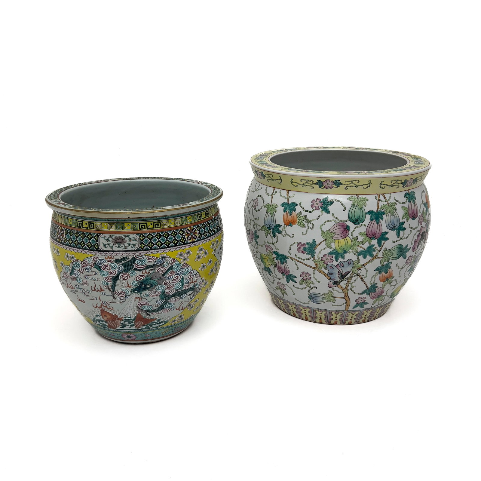 A Chinese Famille Verte and A Famille Rose Porcelain Fish Bowls (2): Lot 46 A Chinese Famille Verte and A Famille Rose Porcelain Fish Bowls (2) porcelain, glaze, enamel pigments largest: 13 1/2 x 16 inches Description: Two large Chinese porcelain fish bowls or jardini&