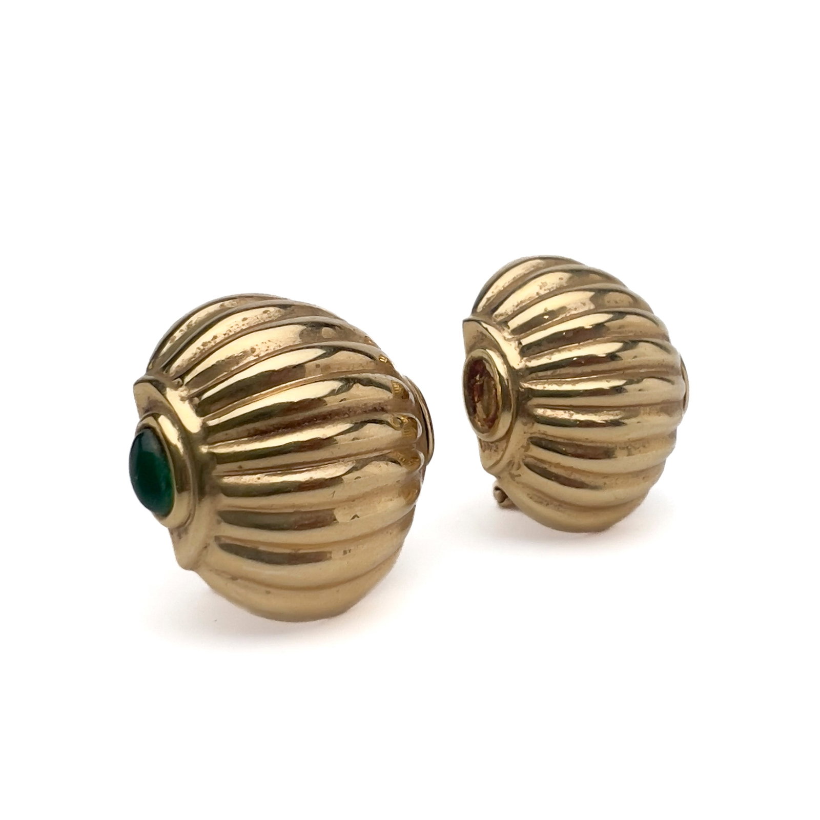 Pair of 14k Yellow Gold Ribbed Dome Earrings: Lot 106 Pair of 14k Yellow Gold Ribbed Dome Earrings 14k gold, emerald stamped Description: A pair of vintage hollow-form cast 14-karat yellow gold dome earrings featuring a continuous deeply reeded a
