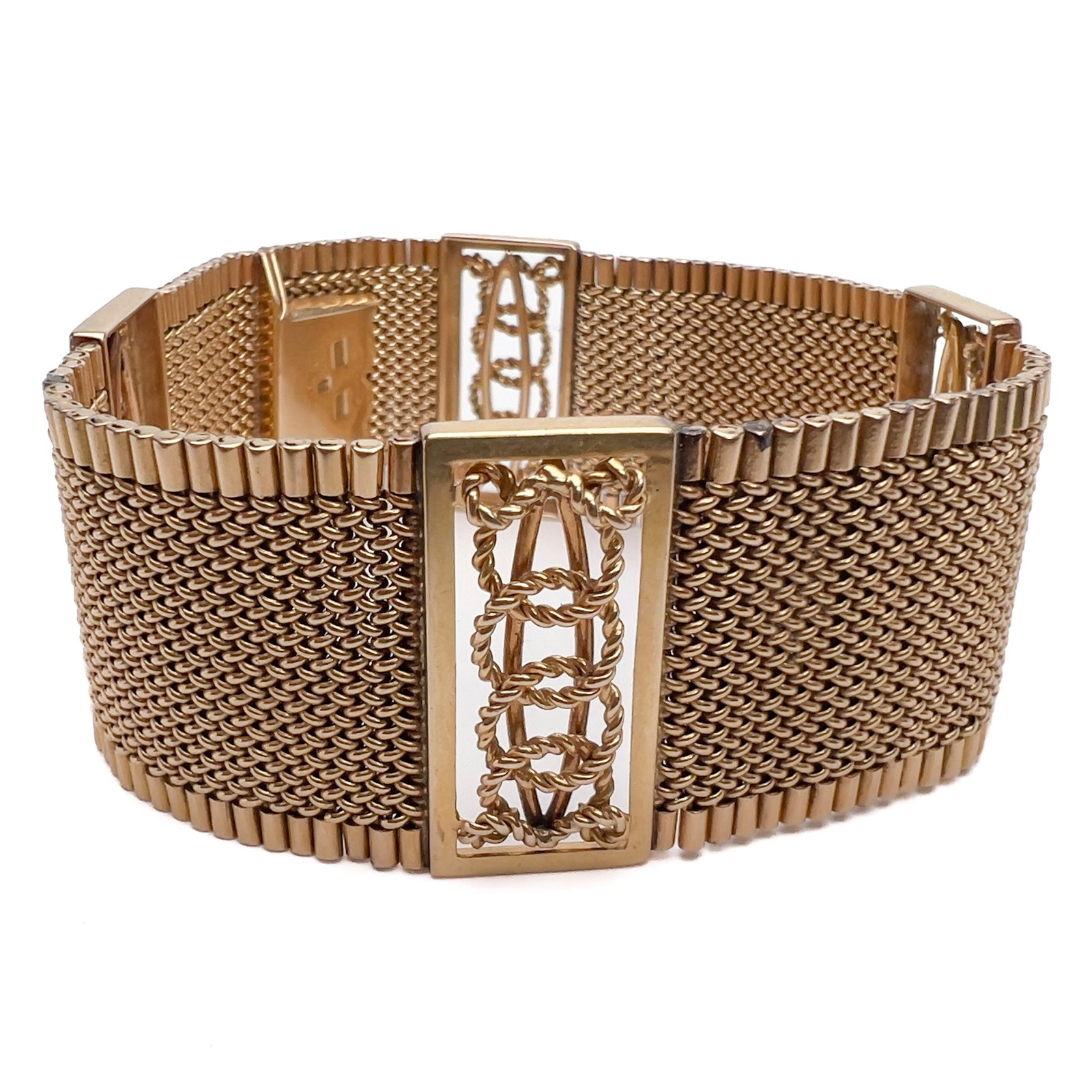 An Argentine 18k yellow gold mesh bracelet: Lot 120 An Argentine 18k yellow gold mesh bracelet (mid-20th Century) 18k yellow gold 7 1/2 x 1 inches stamped Description: A heavy 18-karat yellow gold mesh chain bracelet weighing approximately