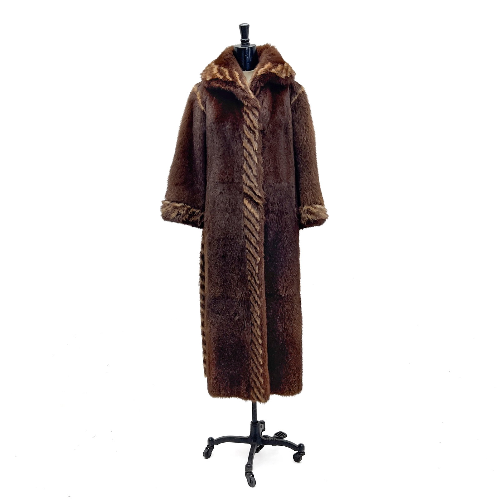 Henri Bendel - Full-Length Fur Coat: Lot 168 Henri Bendel American Manufacturer (Founded 1895) Full-Length Fur Coat (Late 20th Century) Fur, Silk Satin Lining Description: An Henri Bendel full-length brown fur coat featuring a prominent 