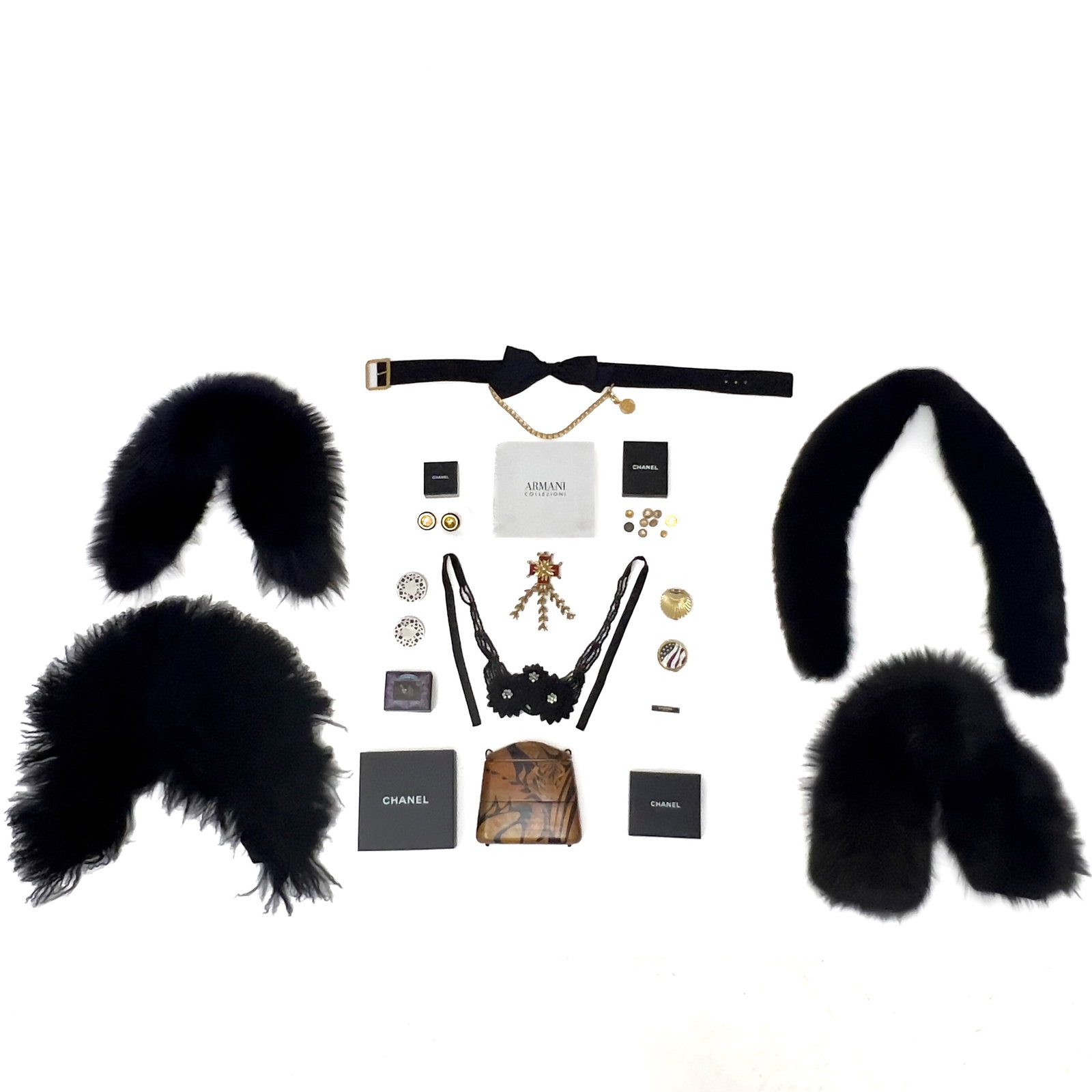 Chanel, Giorgio Armani, and Raphael Sanchez - Buttons, Collars and Costume Jewelry Group: Lot 172 Chanel, Giorgio Armani, and Raphael Sanchez - Buttons, Collars and Costume Jewelry Group Wood, Paint, Fur, Fabric, Base Metal, Plastic Description: An assembled luxury fashion accessory group 
