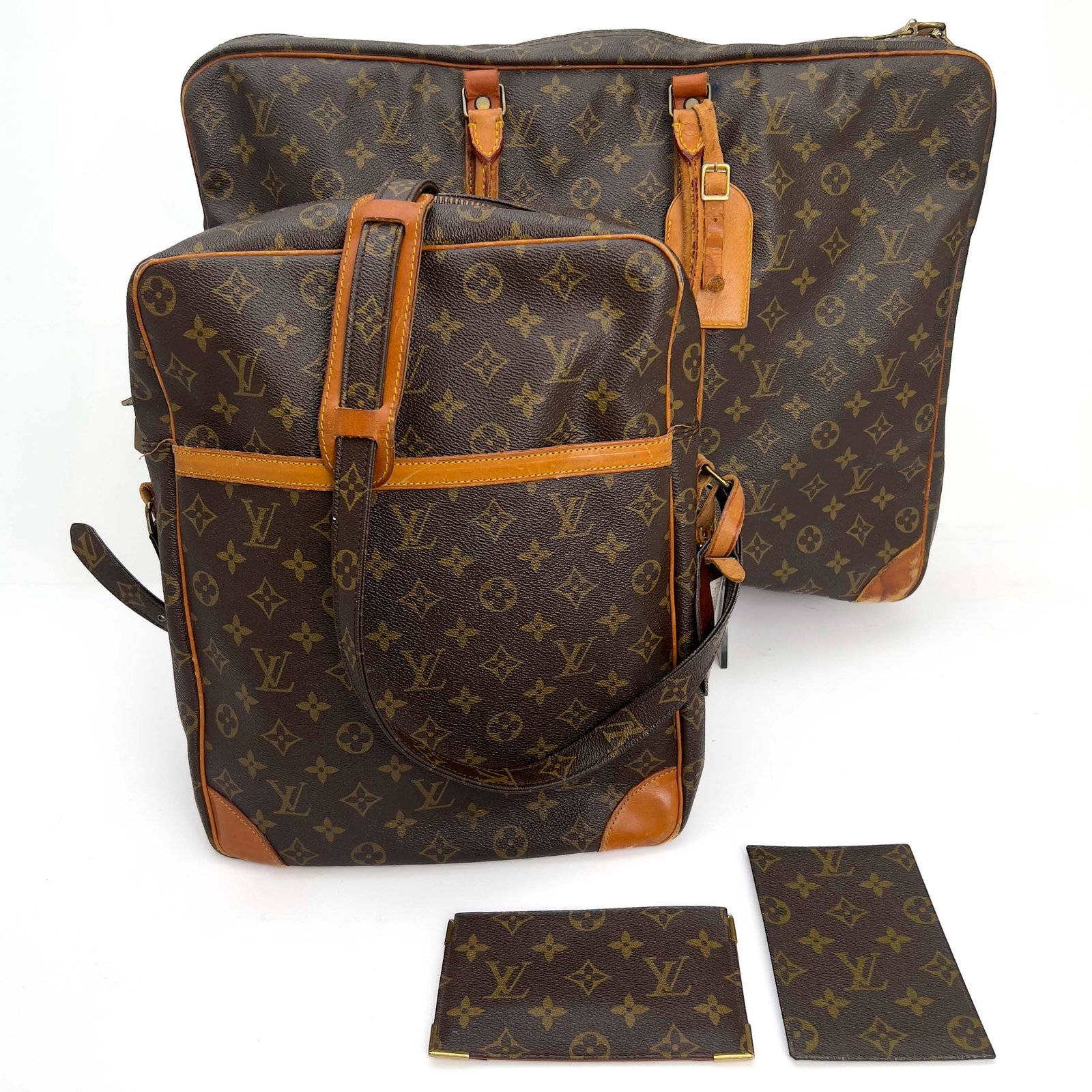 Louis Vuitton - A four-piece leather travel lot (1 of 5)