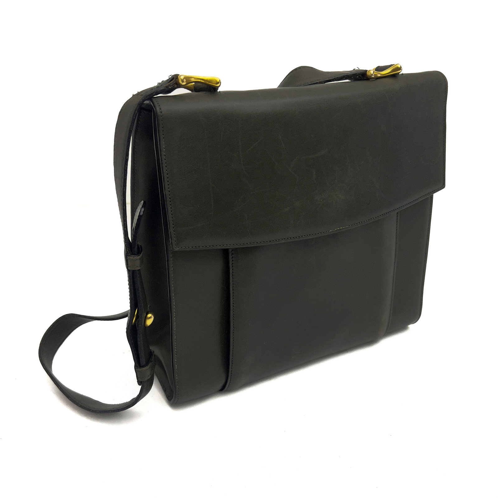 Céline - A Leather Crossbody Bag: Lot 176 Céline French manufacturer (since 1945) A Leather Crossbody Bag Leather, brass, fabric body: 9 1/4 x 9 3/4 x 3 1/2 inches signed Description: A dark olive green textured leather cross