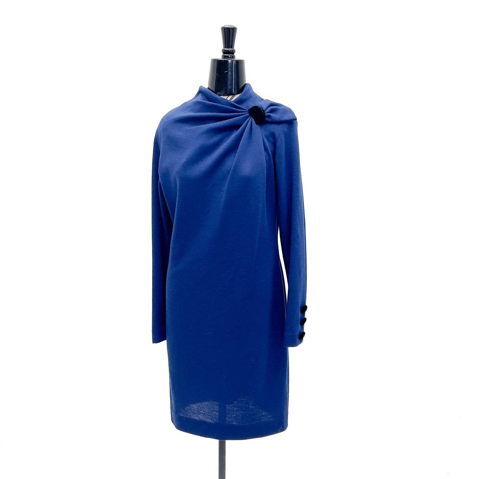 Pierre Balmain - Wool Day Dress: Lot 182 Pierre Balmain French Designer (founded 1945) Wool Day Dress (late 20th Century) Wool with tag Description: A Pierre Balmain 100% blue wool long-sleeve day dress featuring an asymmetrical
