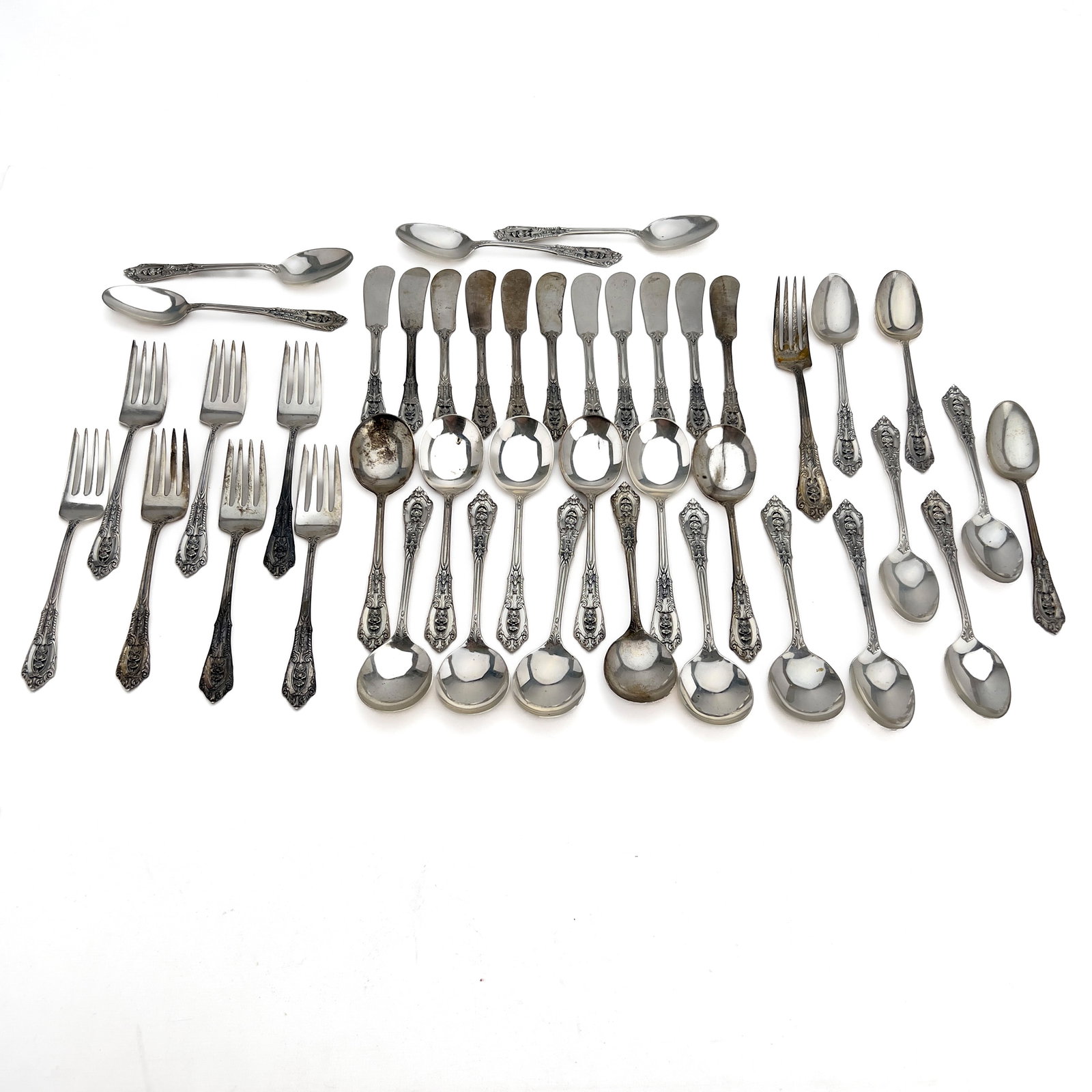 Wallace - Partial \”Rose Point\” Sterling Silver Flatware Set: Lot 192 Wallace American manufacturer (since 1835) Partial \”Rose Point\” Sterling Silver Flatware Set (Mid-20th Century) sterling silver dinner fork: 7 inches stamped Description: A