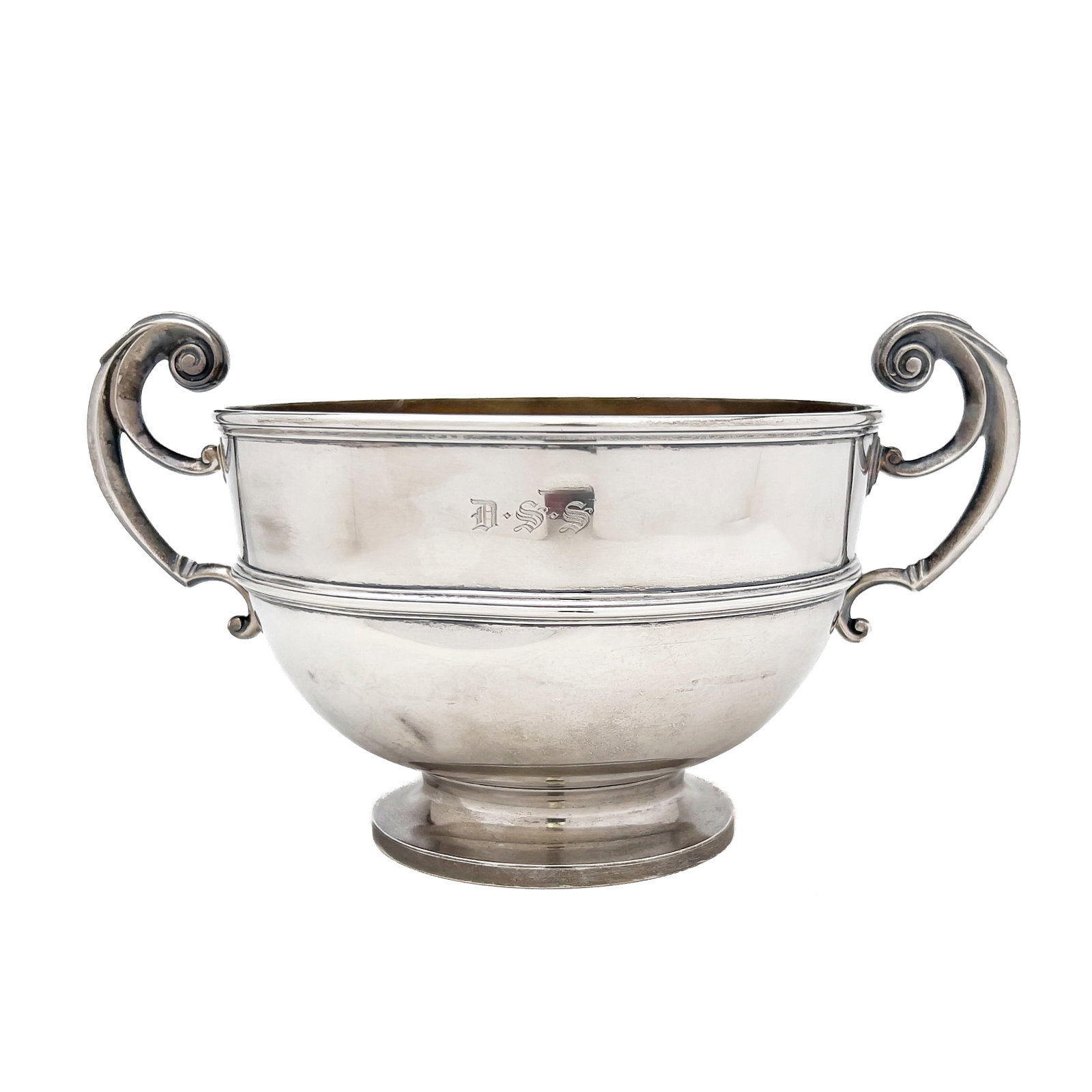 Tiffany & Co. - Sterling Silver Twin-Handled Loving Cup: Lot 207 Tiffany & Co. American Manufacturer (Founded 1837) Sterling Silver Twin-Handled Loving Cup sterling silver 5 3/4 x 10 x 6 3/4 inches stamped Description: An antique die-stamped sterling si