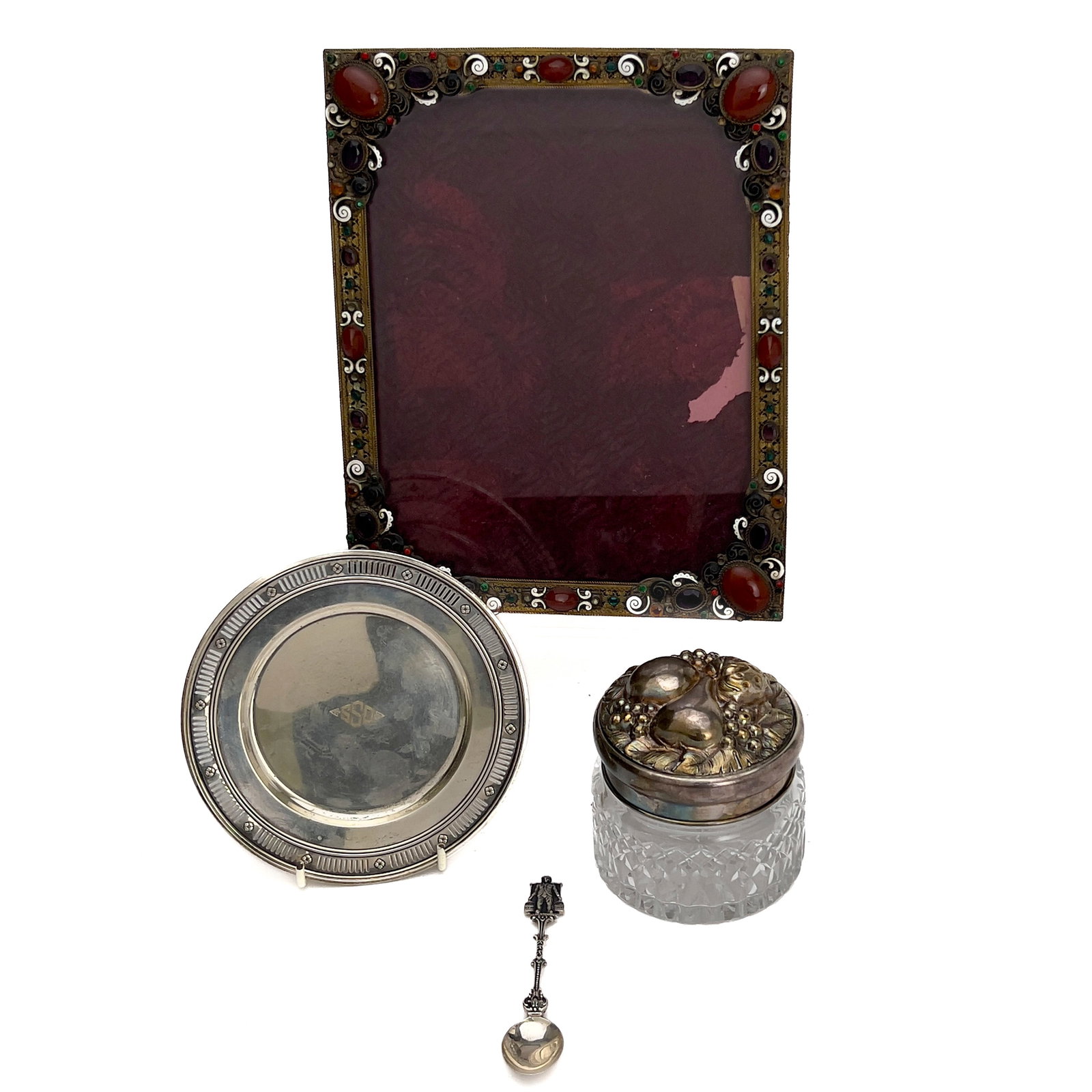 A Group of Sterling Silver Vanity Articles and an Austrian Enamel Frame: Lot 209 A Group of Sterling Silver Vanity Articles and an Austrian Enamel Frame (20th Century) 925 sterling silver, brass, enamel, glass, velvet, wood frame: 10 1/2 x 8 1/2 x 1 inches stamped Descript