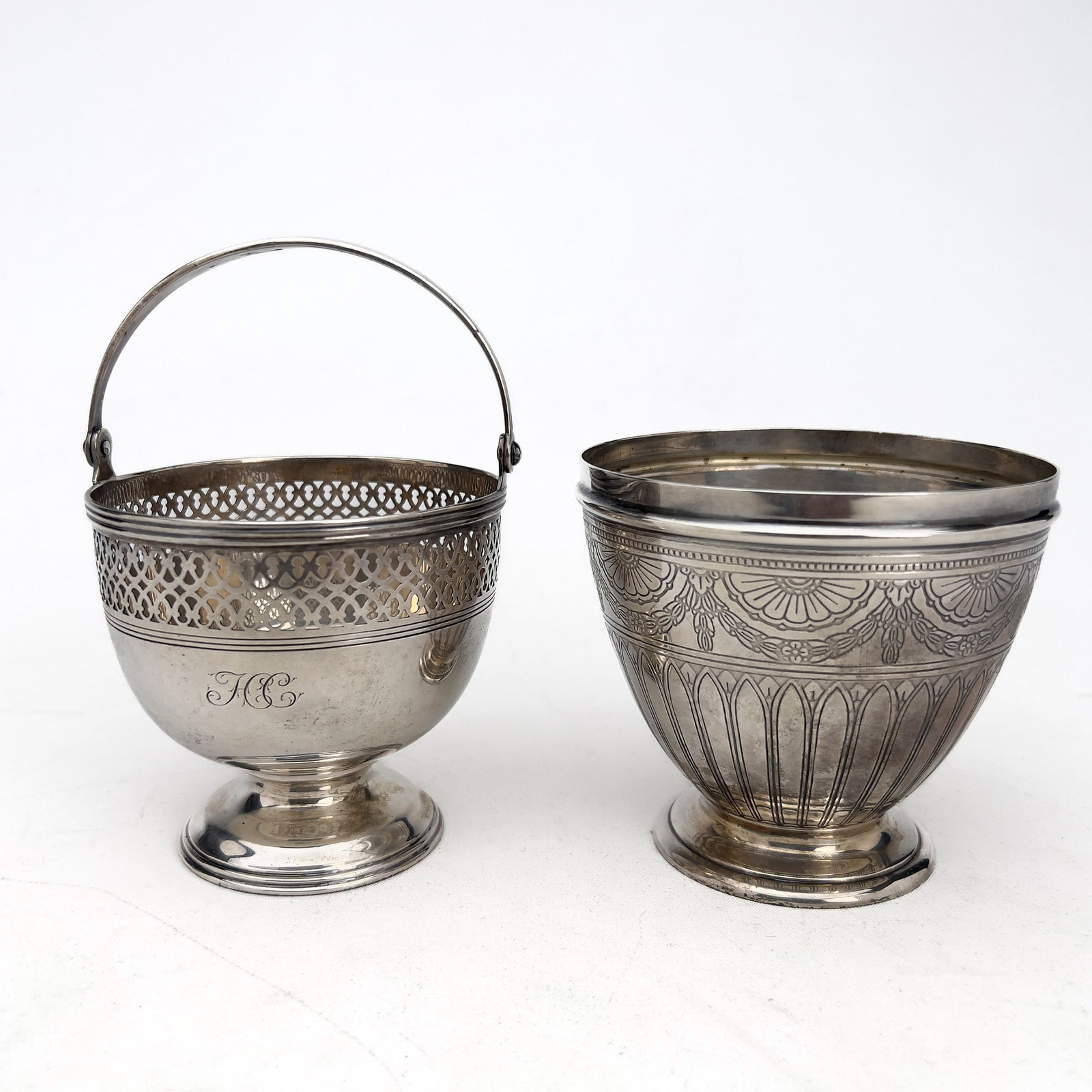 Tiffany & Co. - Two silver condiment servers: Lot 213 Tiffany & Co. American Manufacturer (Founded 1837) Two silver condiment servers sterling silver larger: 3 1/2 x 4 x 4 inches smaller (with handle extended): 5 1/2 x 3 1/2 x 3 1/2 inches stampe