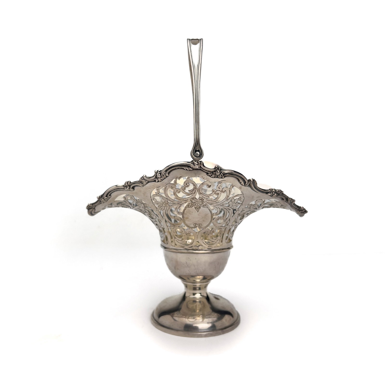 An American Reticulated Sterling Silver Swing-Handle Fruit Basket: Lot 230 An American Reticulated Sterling Silver Swing-Handle Fruit Basket (Early 20th Century) Sterling silver extended 13 x 10 x 6 inches stamped Description: An American sterling silver fruit