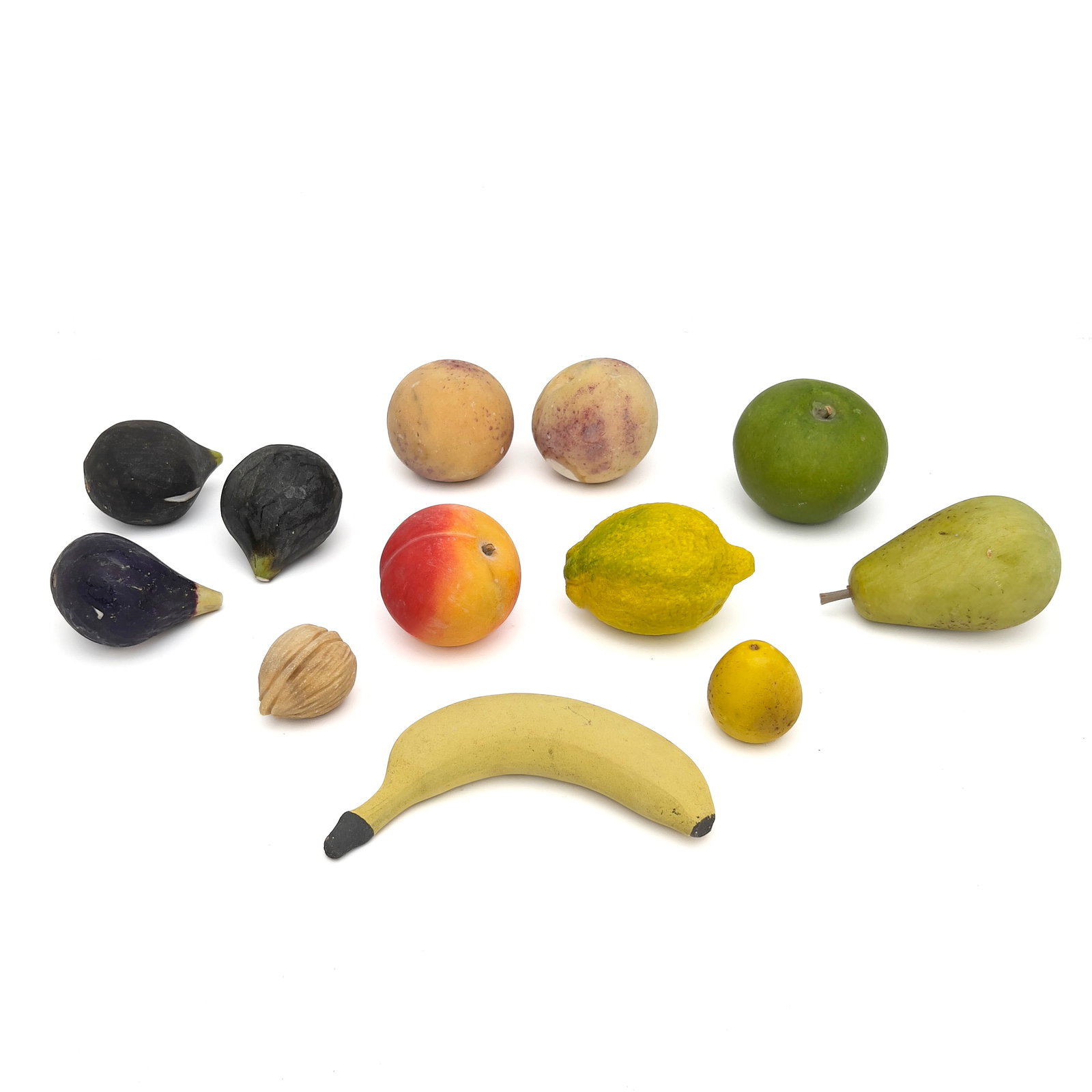 Group of Carved and Polychrome Painted Alabaster Fruit: Lot 252 Group of Carved and Polychrome Painted Alabaster Fruit (20th Century) Alabaster, Pigment Banana: 6 1/4 x 1 1/2 x 3 inches Description: An assembled collection of twelve hand-carved alabaster f