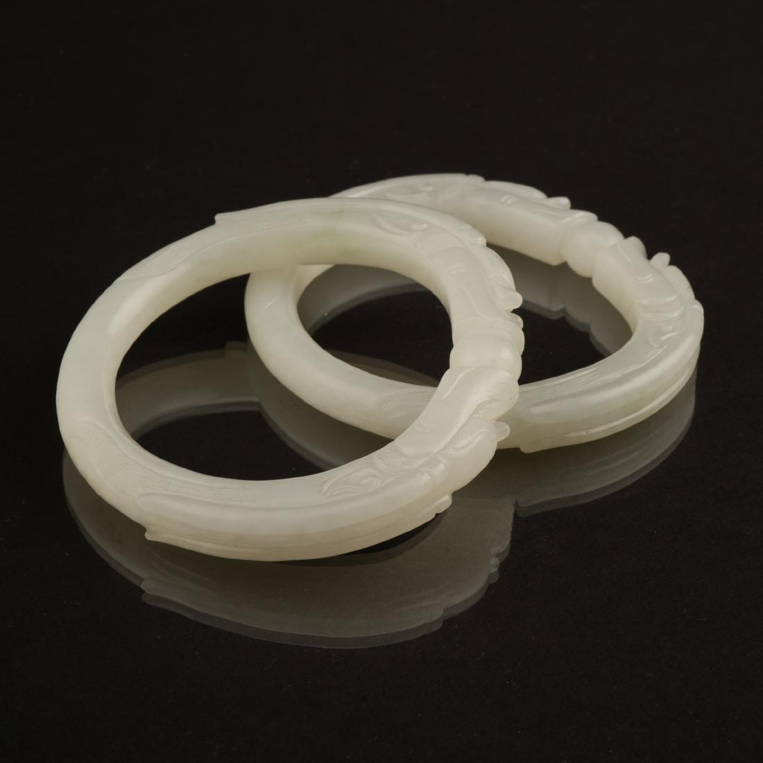 PAIR OF WHITE JADE DOUBLE DRAGONS BANGLES (1 of 10)