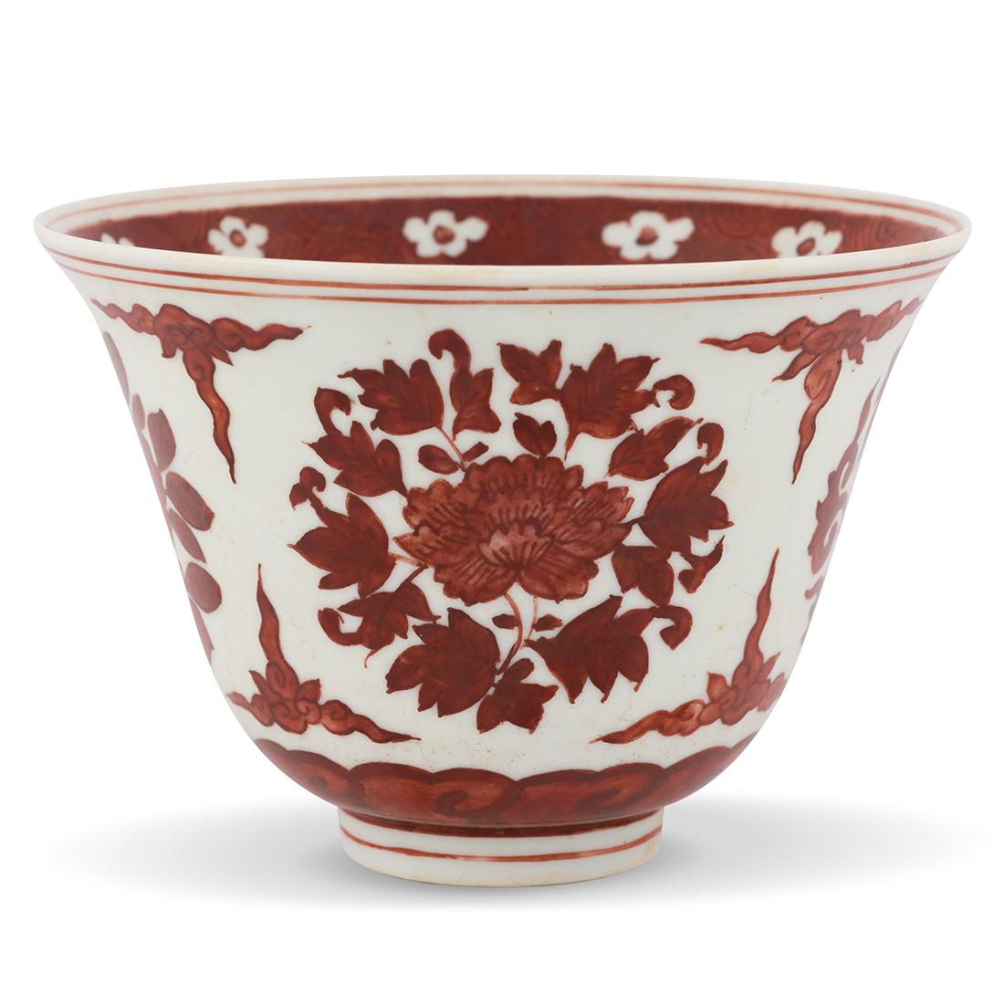 MING JIAJING RED & WHITE FLORAL PORCELAIN BOWL: Chinese Jiajing reign Ming Dynasty period red & white porcelain bowl. with simply gently rounded side emerging steeply to a slightly everted rim, raised on the concave footed ring base. The exterior h