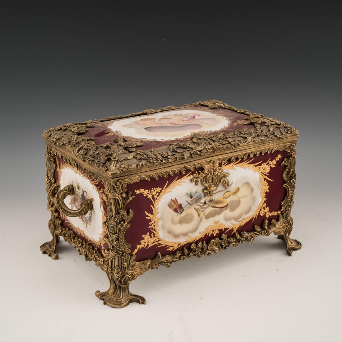 A SEVRES-STYLE PORCELAIN AND BRONZE TABLE CASKET: A Sevres-style porcelain and bronze table casket Measurements: 7.5" H x 14.5" W x 9.5" D