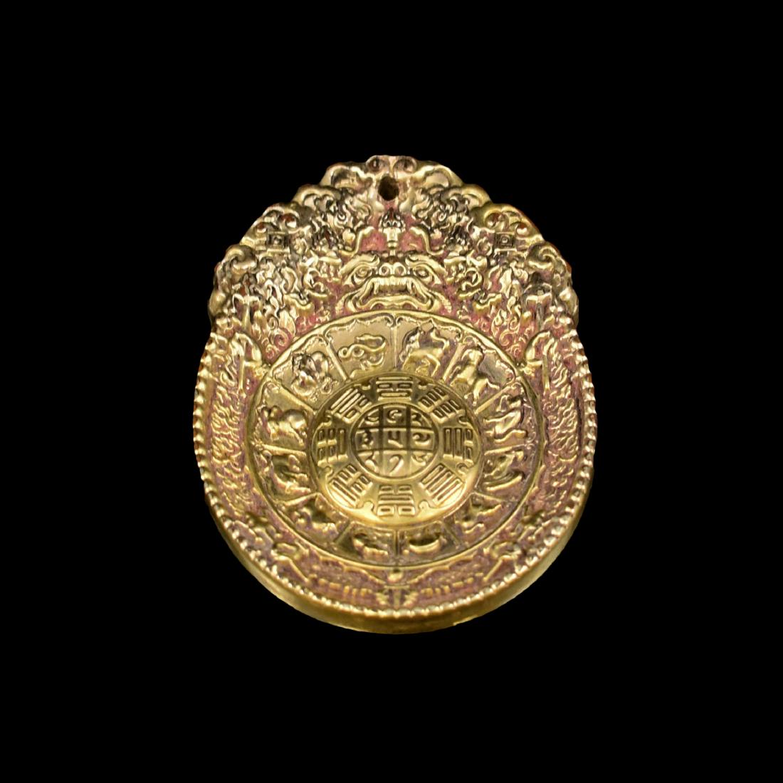 15TH C RARE MING CHINESE 12 ZODIACS GILT BRONZE AMULET: RARE 15th C Ming Dynasty Chinese Gilt Bronze amulet, of semi oval shaped plaque, decorated in shallow relief, with BaGua Eight Diagram surrounded the centralized nine characters. Upright twelve Chines