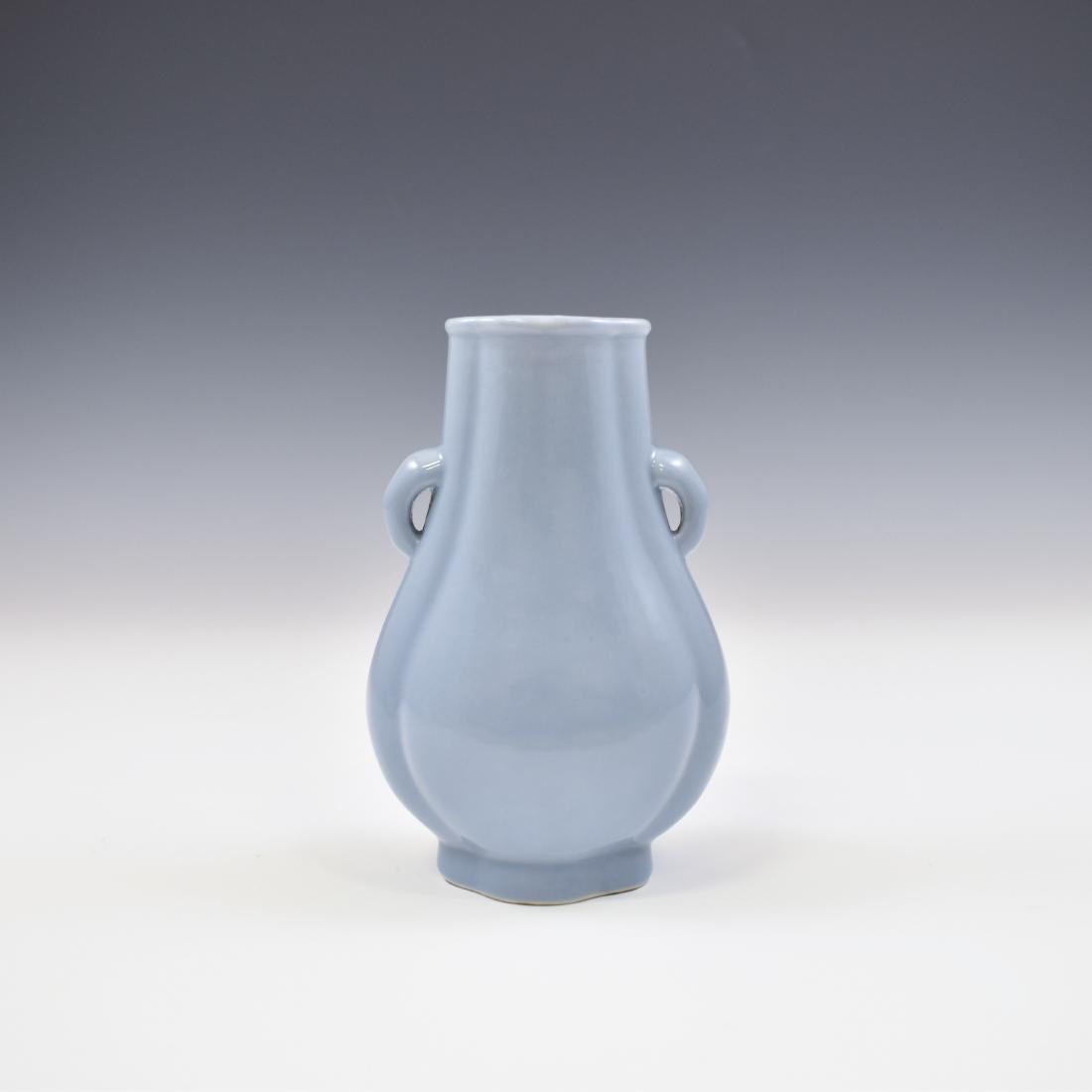 QIANLONG DOUQING ZUN VASE: Chinese Qing porcelain Zun vase is stoutly potted in form of traditional squared Zun vessel, of semi-rectangular pear shape with grooved edges, bottom-heavy body gently raised the wider prominent neck