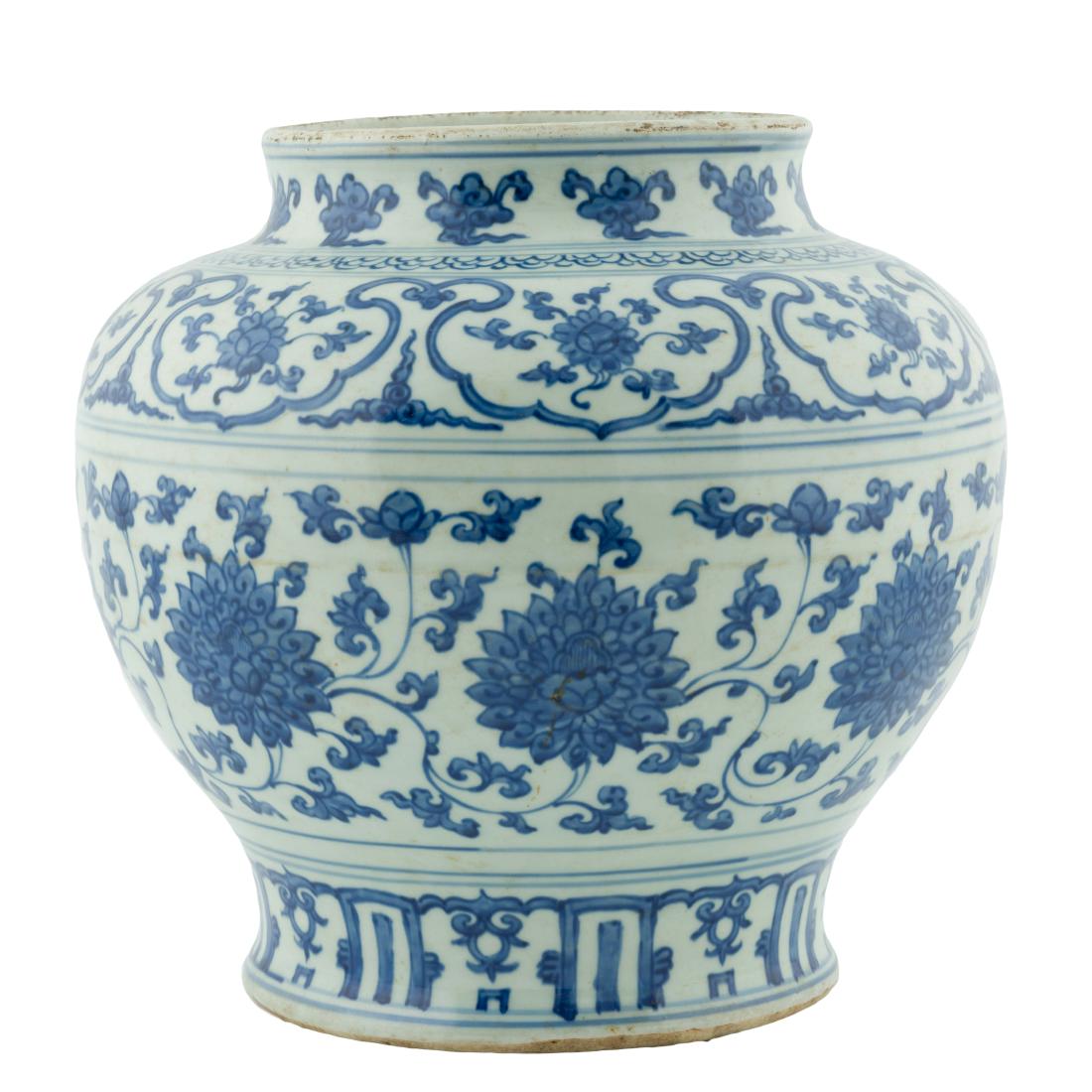 MING BLUE & WHITE WRAPPED FLORAL JAR: Chinese Ming Dynasty blue and white porcelain Jar. Sturdy porcelain jar with robust shoulder region curving into a feminine waist that extends all the way to the bottom forming the raised circular bas