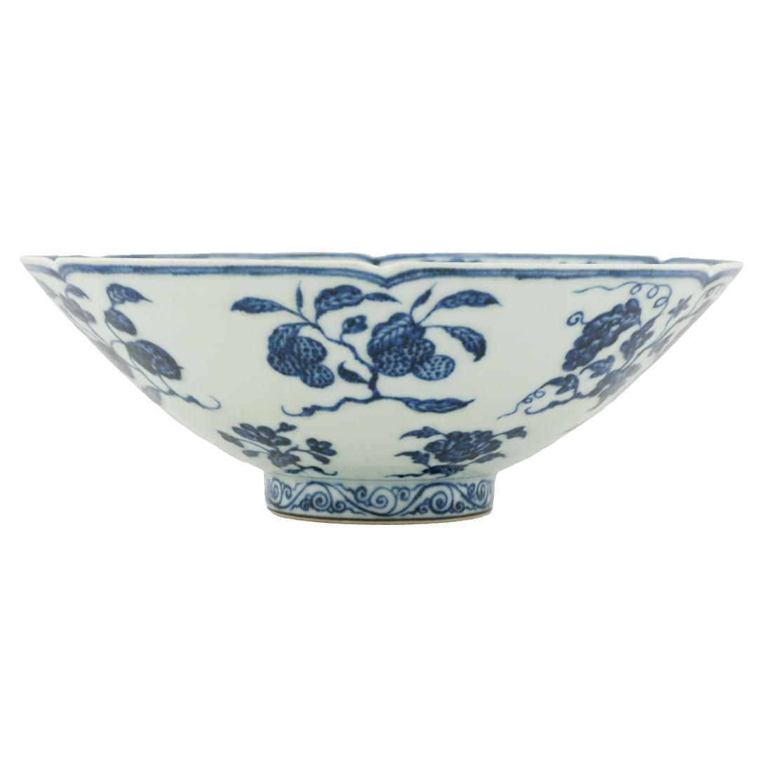 XUANDE BLUE & WHITE FRUIT ABUNDANT BOWL: Chinese Ming Dynasty Xuande Emperor Reign period, blue and white flowers and abundant lychee fruits porcelain bowls. Deep curvature, straight upward to floral form rim, with a slightly raised footing.
