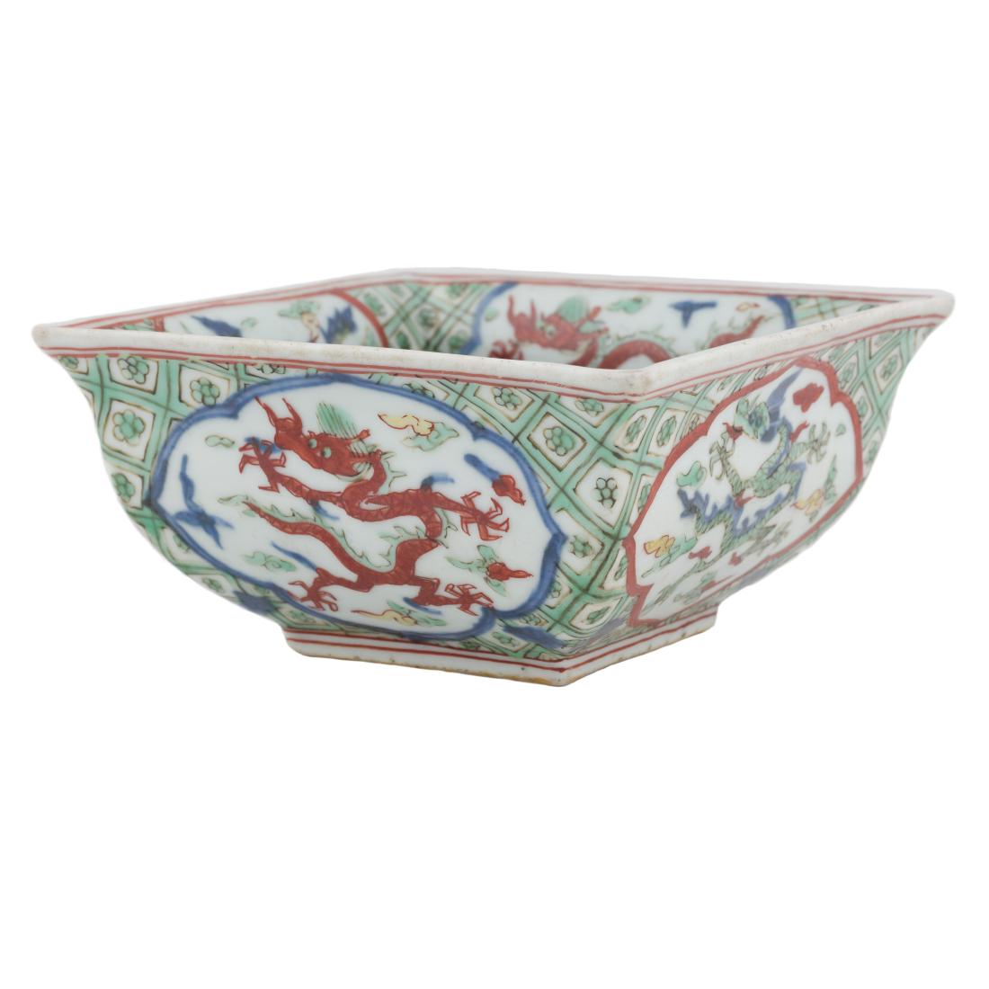 MING JIAJING WUCAI BRUSH WASHER: Chinese Ming Dynasty Jiajing Emperor Reign period, Wucai brush washer. Thick potted, shaped in upturning pyramidal form, with deep straight sides elevated from wide flat square base, and flaring to wi