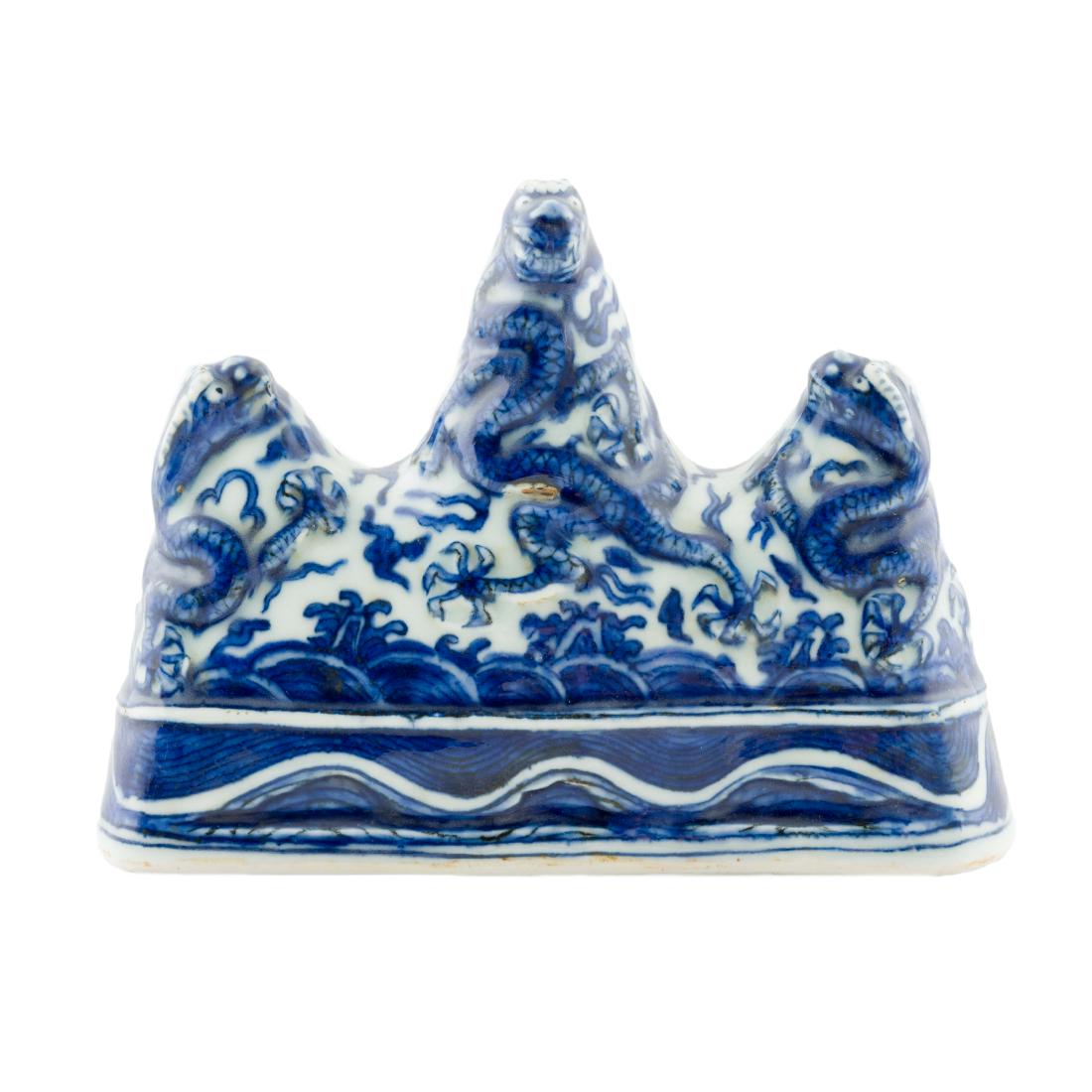 MING BLUE & WHITE THREE PEAKS PEN REST: Chinese Ming Dynasty blue and white porcelain pen rest. All reserved hand painted ornamentations are rendered in clean white underglaze base color which contrast against the cobalt blue fine color. Th
