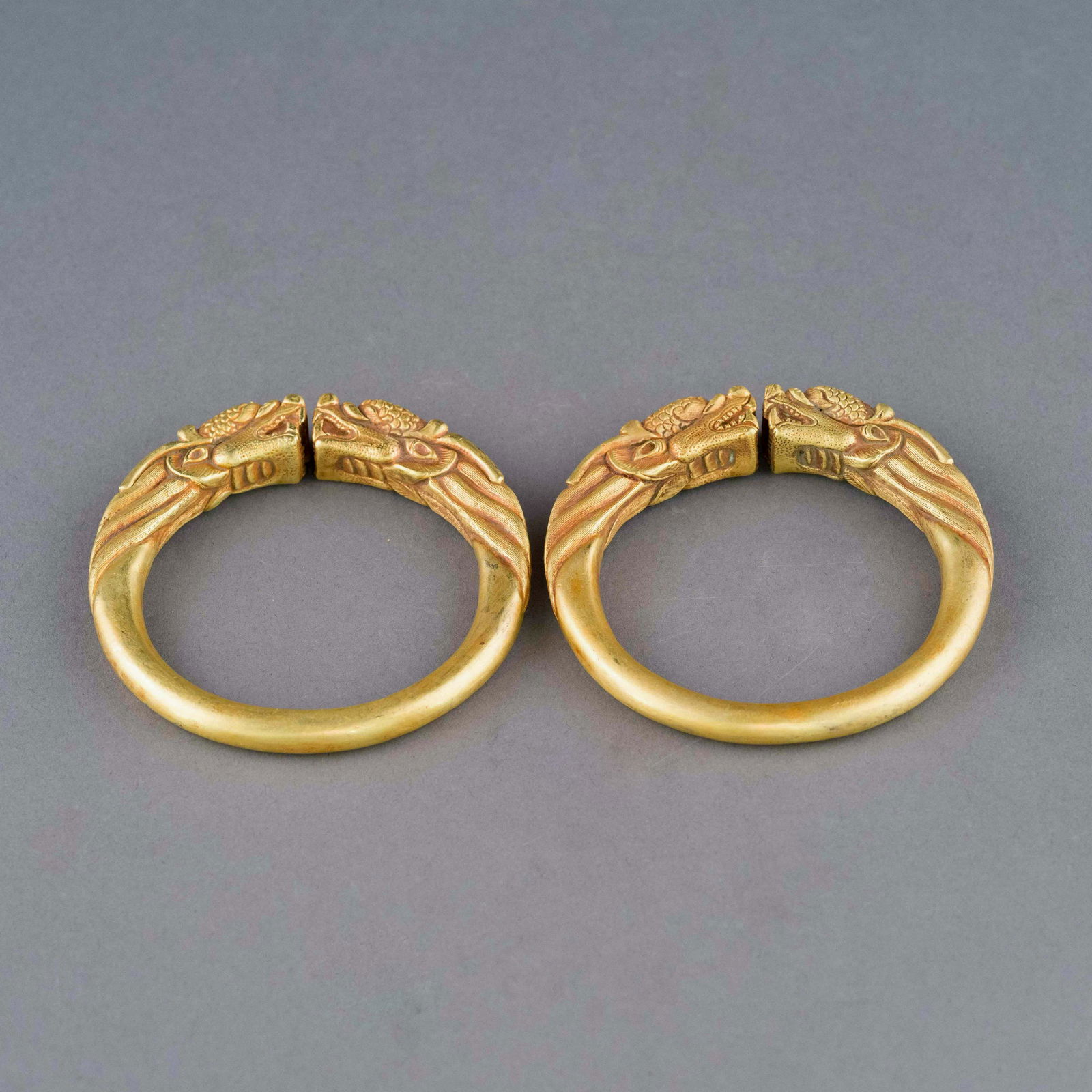 PAIR QING GILT BRONZE DRAGON MOTIF BANGLES (1 of 10)