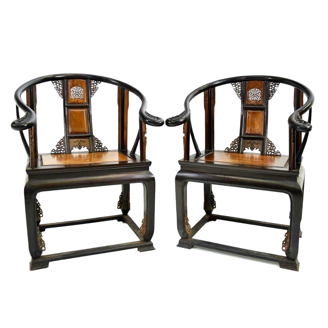 PAIR ZITAN & YINGMU HORSESHOE BACK ARM CHAIRS: A PAIR OF FINE CHINESE ZITAN & BURL YINGMU WOOD PANEL HORSESHOE BACK ARM CHAIRS, QUANYI.With sweeping crest rail terminating in out swept hooks above shaped spandrels, all above the curved splat carve