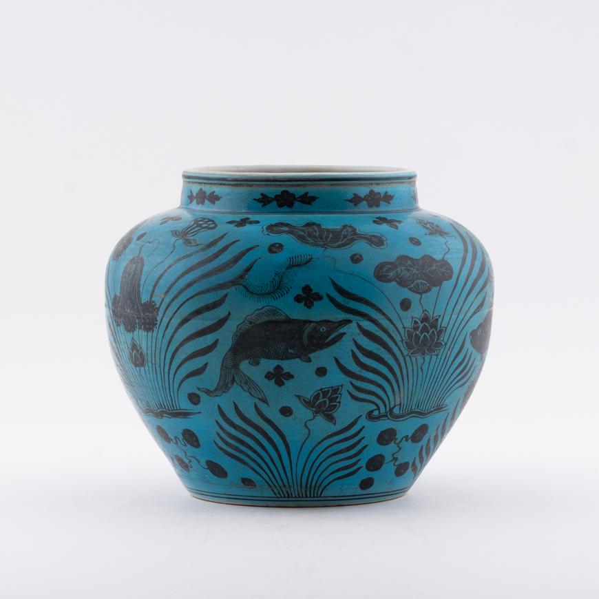 MING XUANDE PEACOCK GREEN LOTUS PORCELAIN JAR: Measurements: Height: 9.5" Width/Lenght: 10.75" Diameter/Depth: 10.75" Chinese Ming Dynasty, Xuande peacock green lotus porcelain jar. Potted in large cylinder vessel, jar shape, having thick and tall