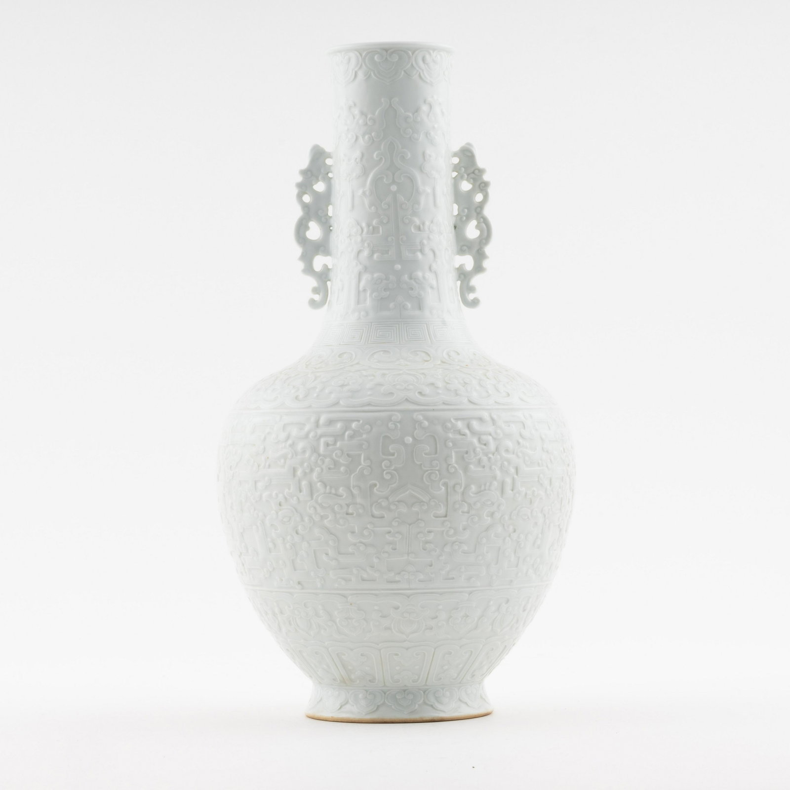 QING DOUCING GLAZED AMPHORA REWARD VASE: Measurements: 14in x7.5in x 7.5in Chinese Qing Dynasty period, doucing glazed porcelain amphora reward vase. Potted in reward shape vase, thick and tall, globular lower body, tapered gracefully toward