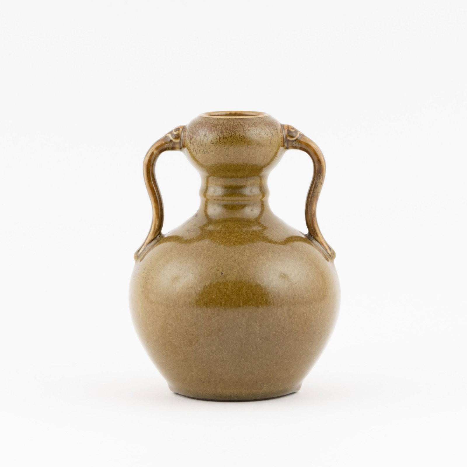 QING TEA DUST GLAZED AMPHORA GARLIC VASE: Measurements: 7.25in x5.25in x 5.25in Chinese Qing Dynasty Period, Tea dust glazed porcelain amphora garlic vase. Potted in garlic bottle vase, bulbous lower belly, thick, with rounded shoulder, short