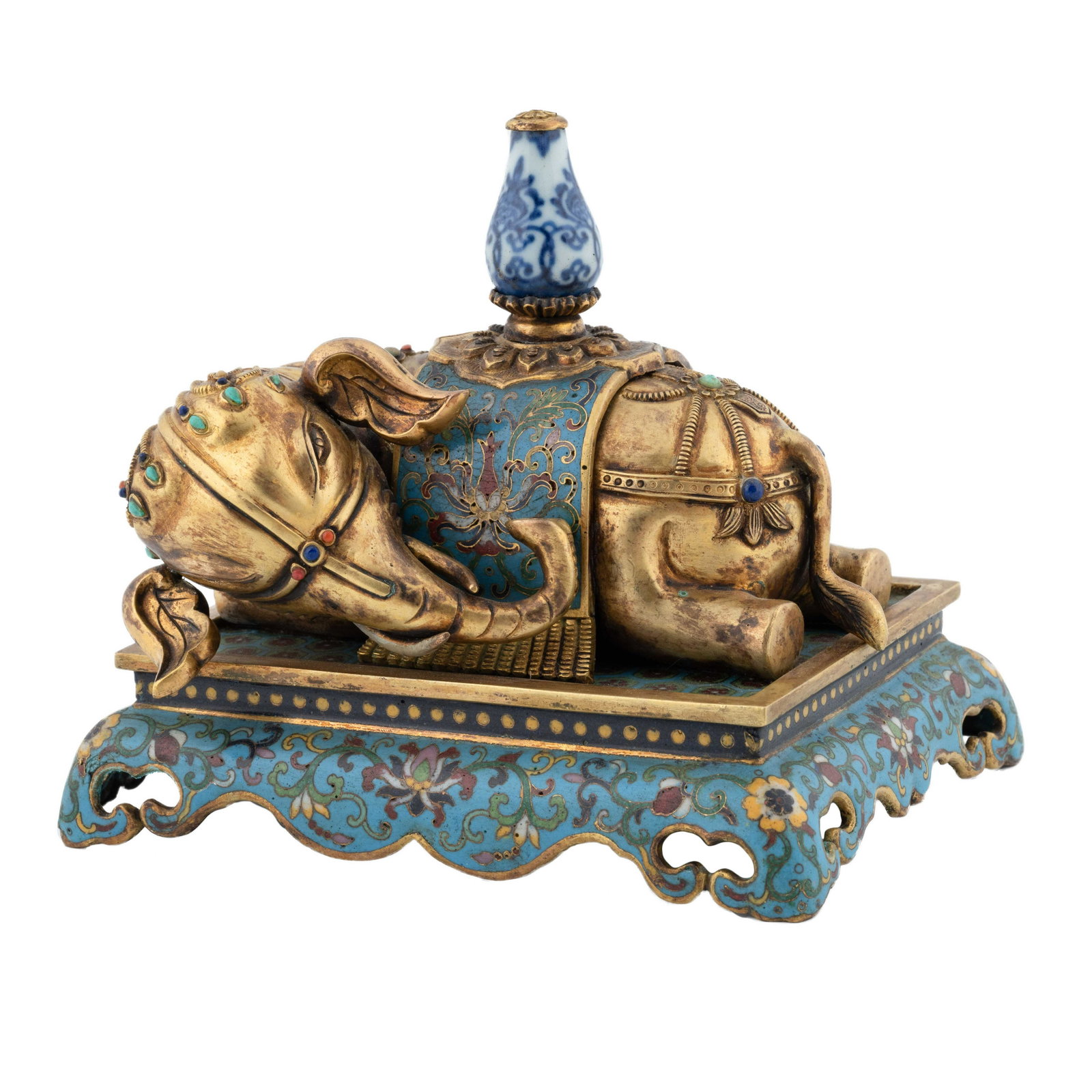 QING DYNASTY GILT BRONZE AND CLOISONNE ELEPHANTS WITH: Measurements: Height: 5 1/2" Width: 5 3/4" The Chinese gilt bronze forged to a modeled in the form of a caparisoned rested figure of an elephant, the head slightly facing left shoulder, carrying a por