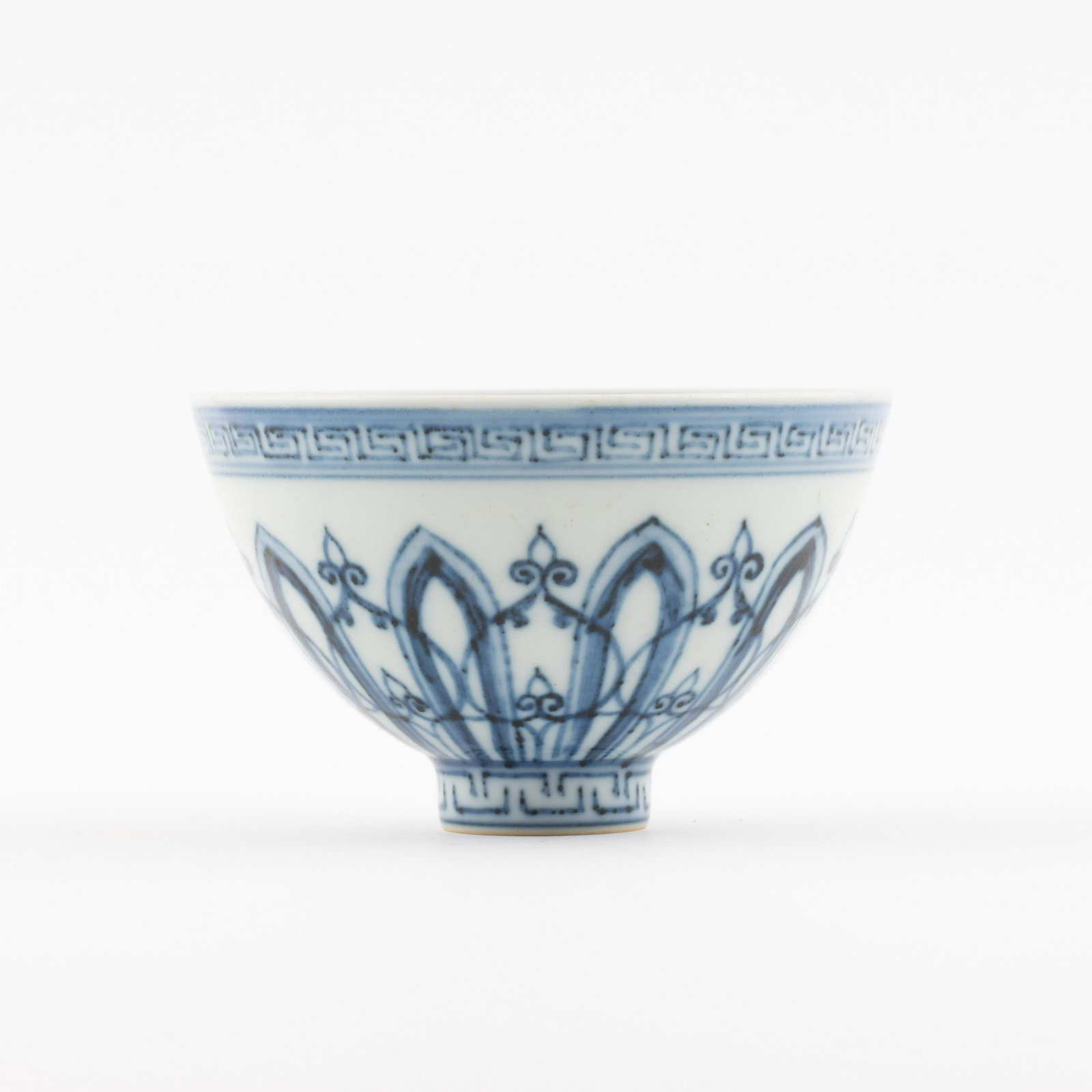 MING BLUE & WHITE GEOMETRICAL MOTIF BOWL: Measurements: 2.625in x4.25in x 4.25in Chinese Ming Dynasty Period, blue & white geometrical motif porcelain bowl. Potted with a shallow body, slight deep, thick and bulbous body, with angled cavetto 