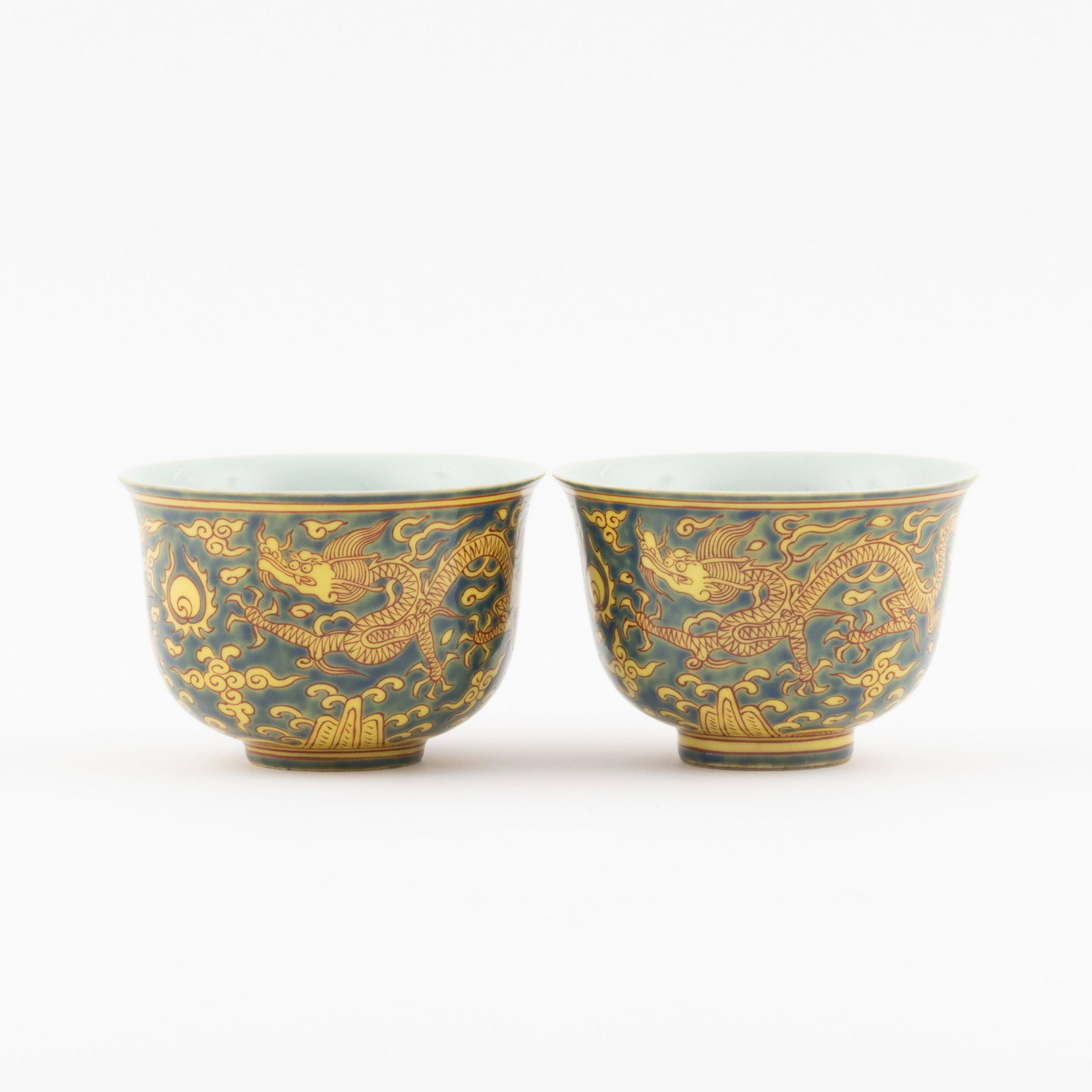 PR. MING JIAJING YELLOW AND RED DRAGON BOWLS: Measurements: 2.875in x4.125in x 4.125in Pair of Chinese Ming Dynasty Period, JiaJing yellow and red dragon motif porcelain bowls. Potted with a shallow body, slight deep, thick and bulbous body, with