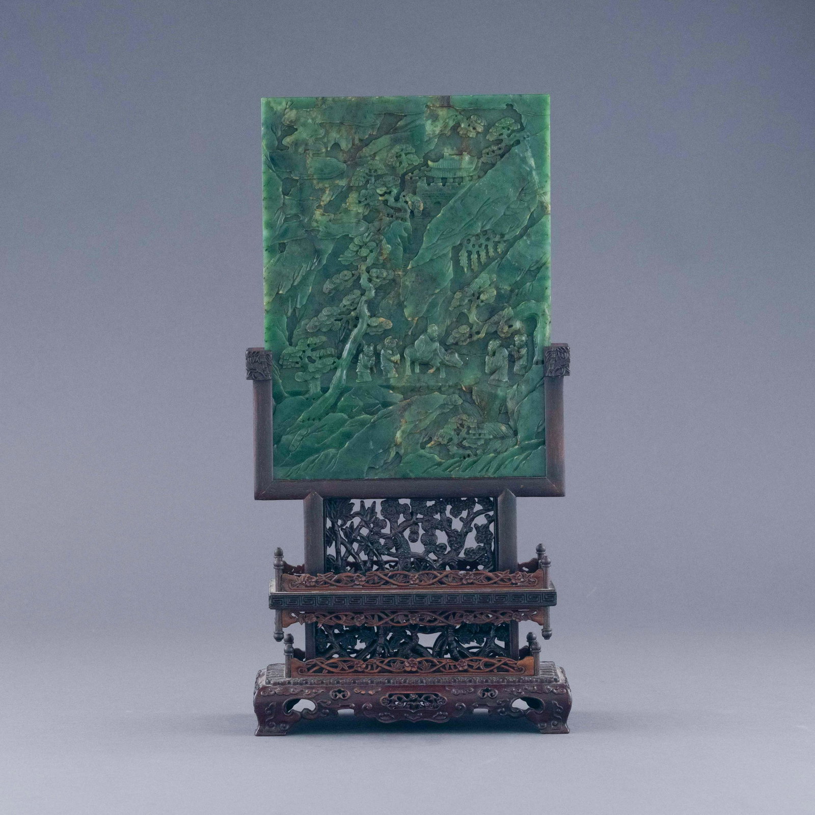 GREEN JADE LANDSCAPE TABLE SCREEN: Measurements: 15.5in H x 7.875in W x 3.625in D Majestic, Chinese Qing Dynasty Period, Green jade landscape table screen. Chinese spinach-green jade with semi-precious hard stone inlaid, of rectangular