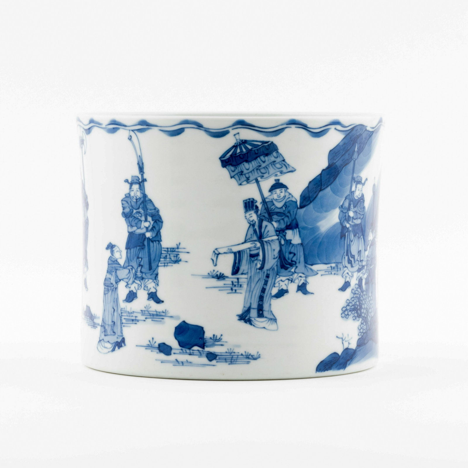 KANGXI BLUE & WHITE FIGURIAL BRUSH POT: Dimensions; 6.25in H x 7.75in W x 7.75in D PROVENANCE: from the Estate of Senior Chief Petty Officer Aviation Engineer Thomas Clanton, USN Ret., (1935-2019), of Scout Trace, Blairsville and a former l